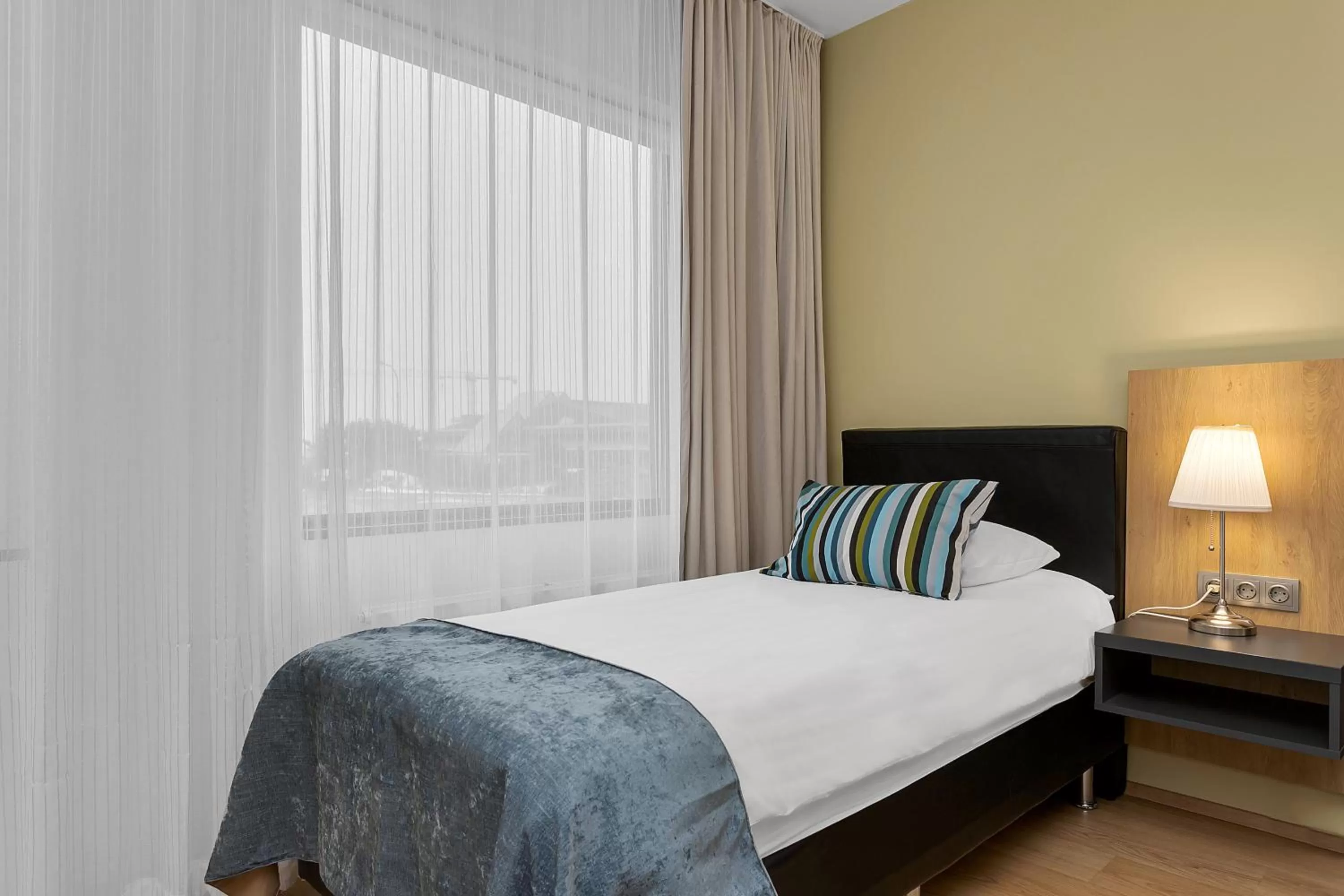 Bed in Aurora Hotel at Reykjavik-Keflavik Airport Terminal KEF