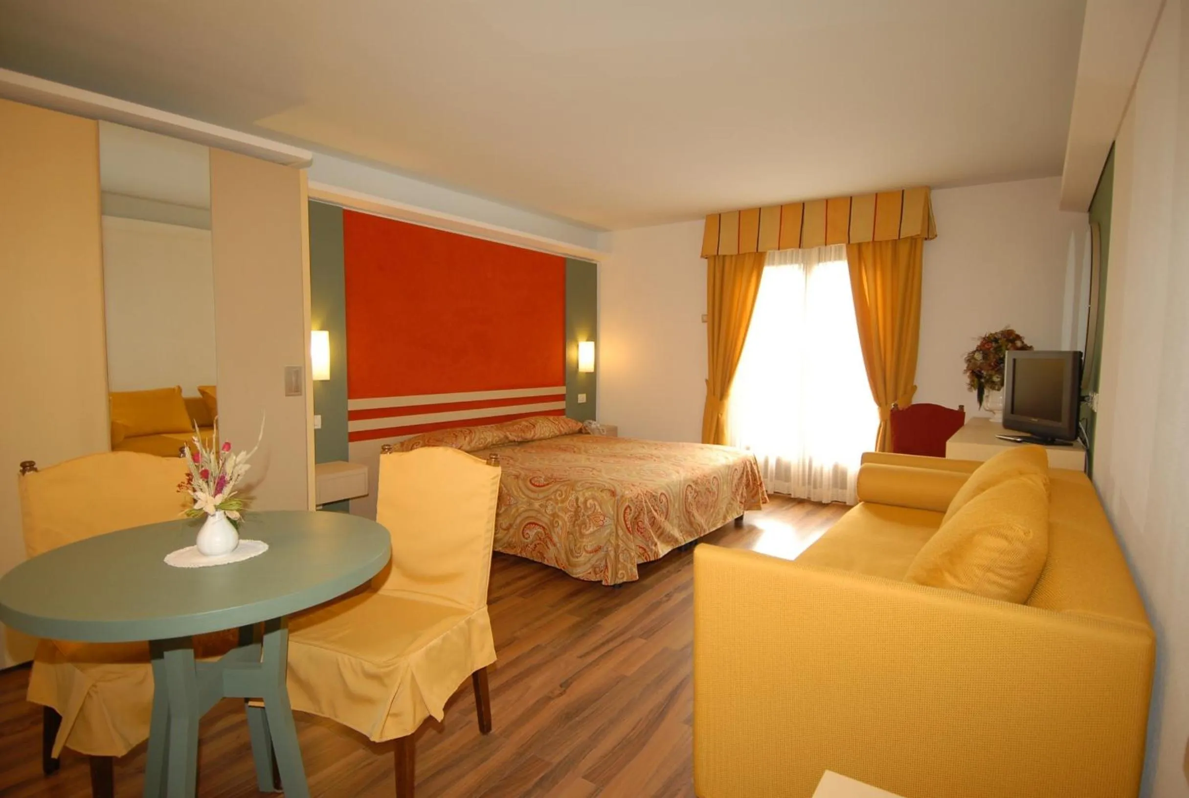 Photo of the whole room, Bed in Hotel Baita Clementi