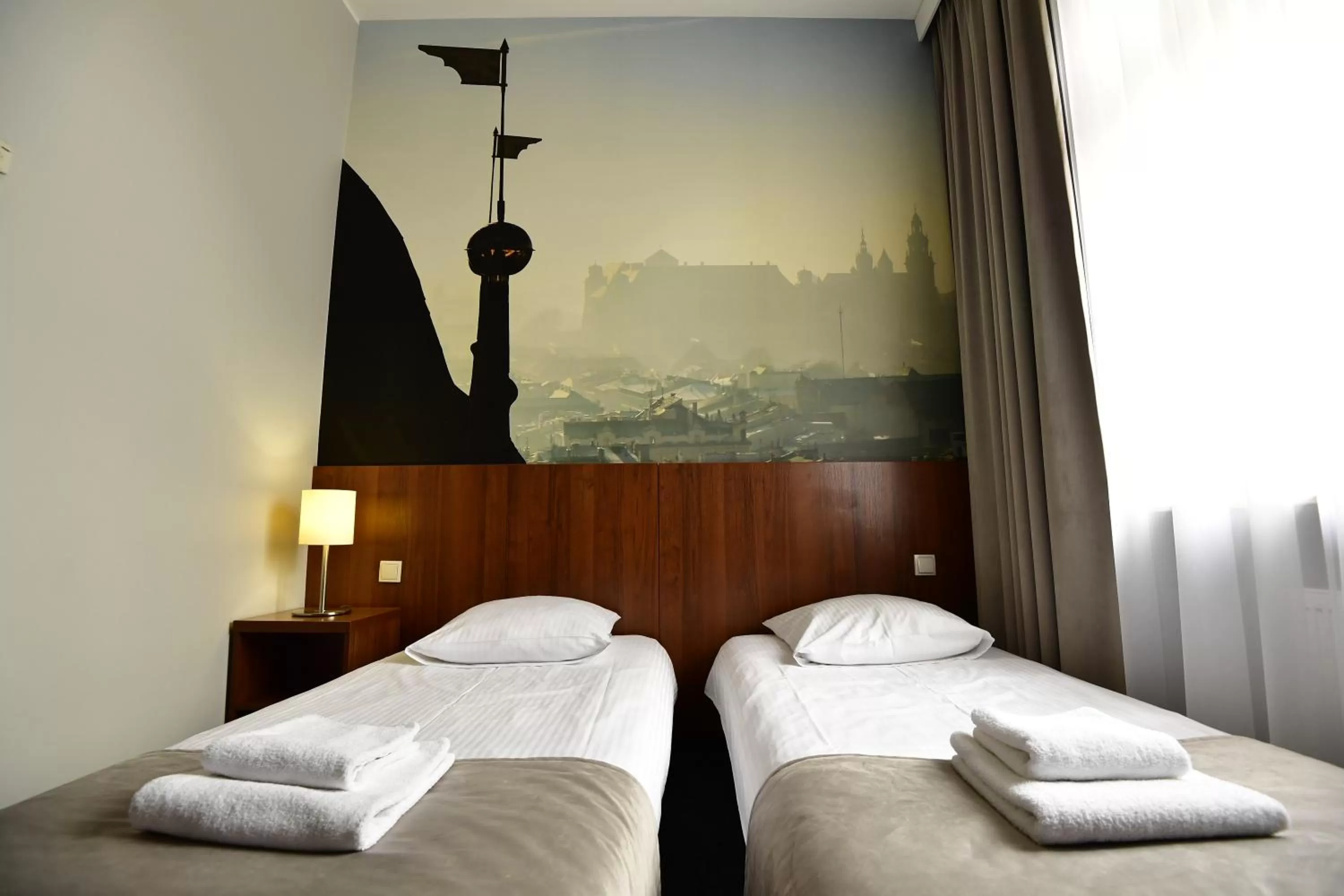 Bed in Hotel Downtown Kraków