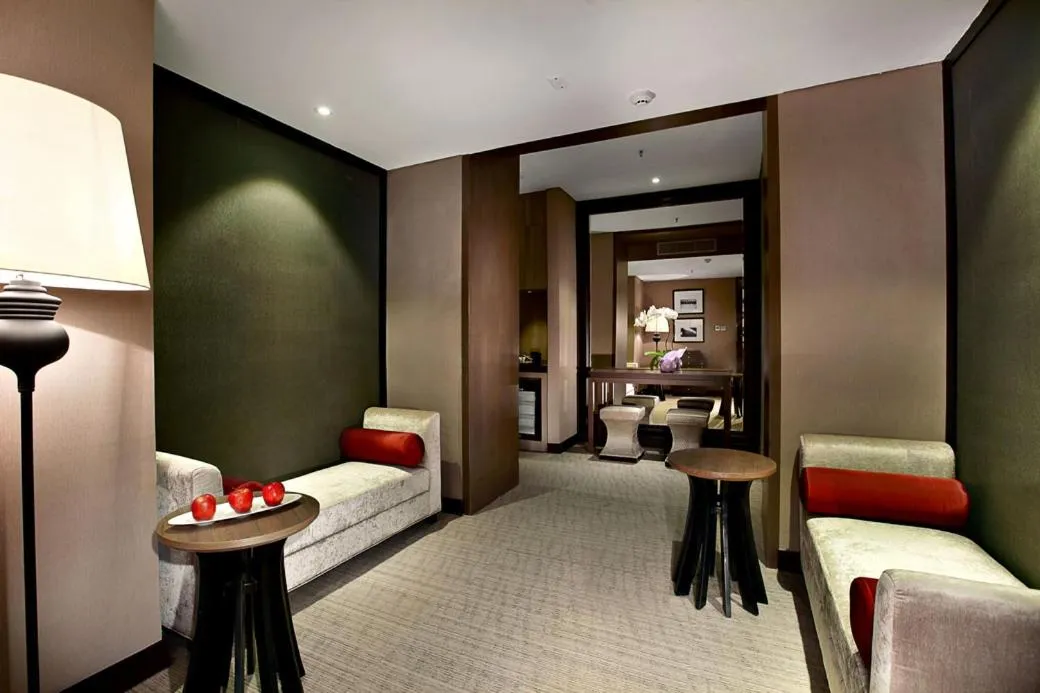 Living room, Bed in Aston Priority Simatupang Hotel and Conference Center