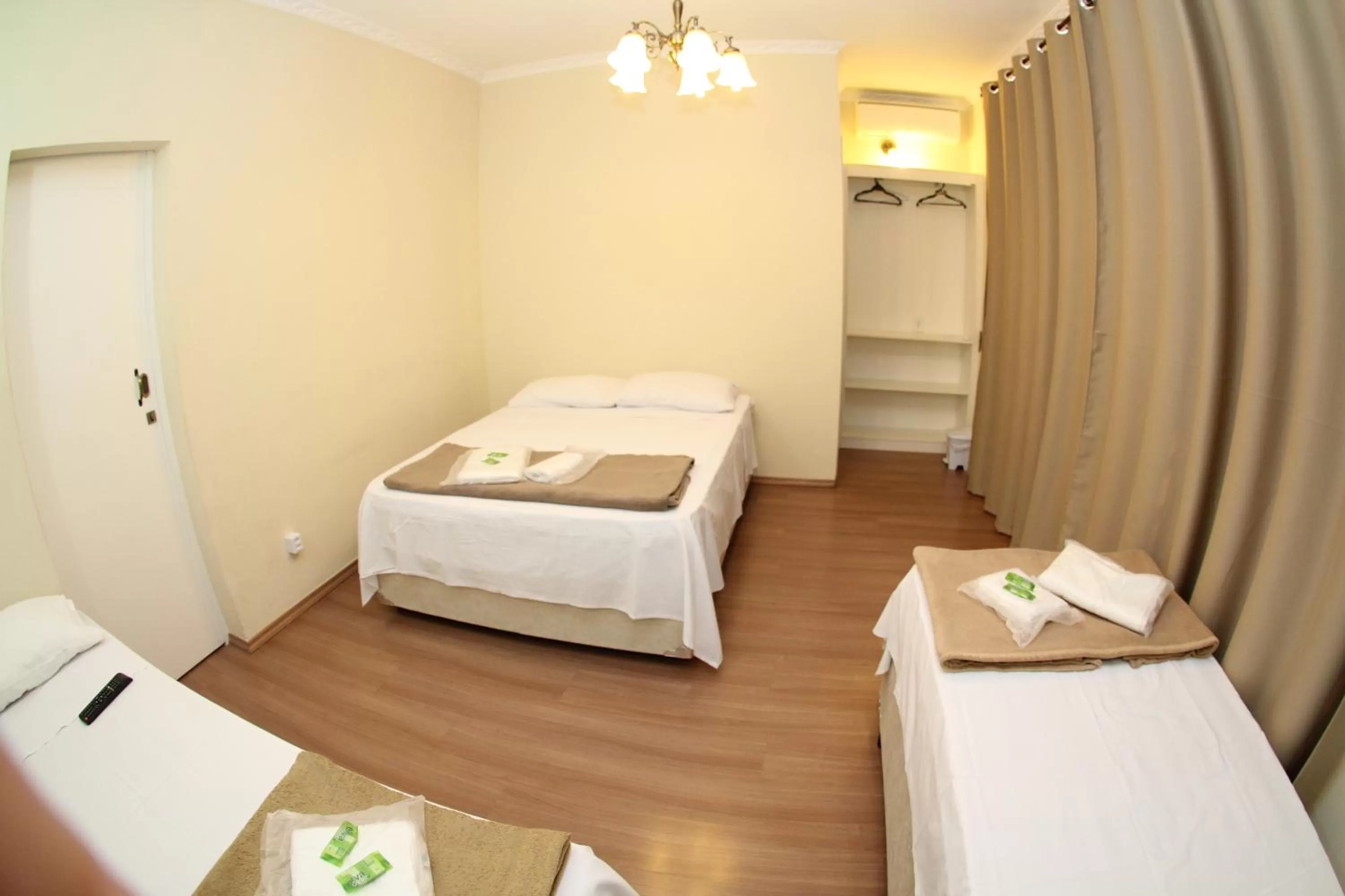 Bed in Pousada Santa Genebra