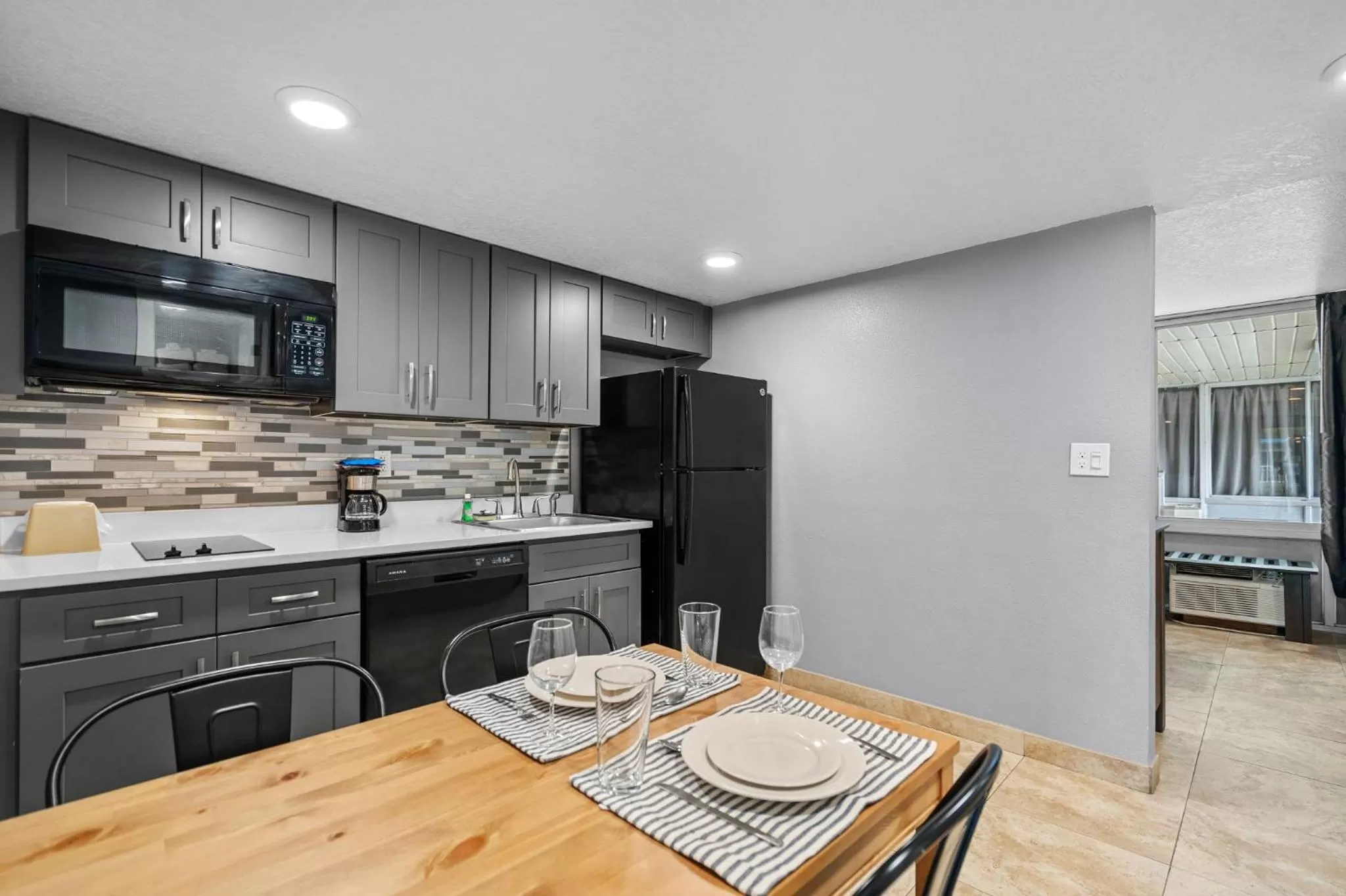 Kitchen or kitchenette in Celebration Suites