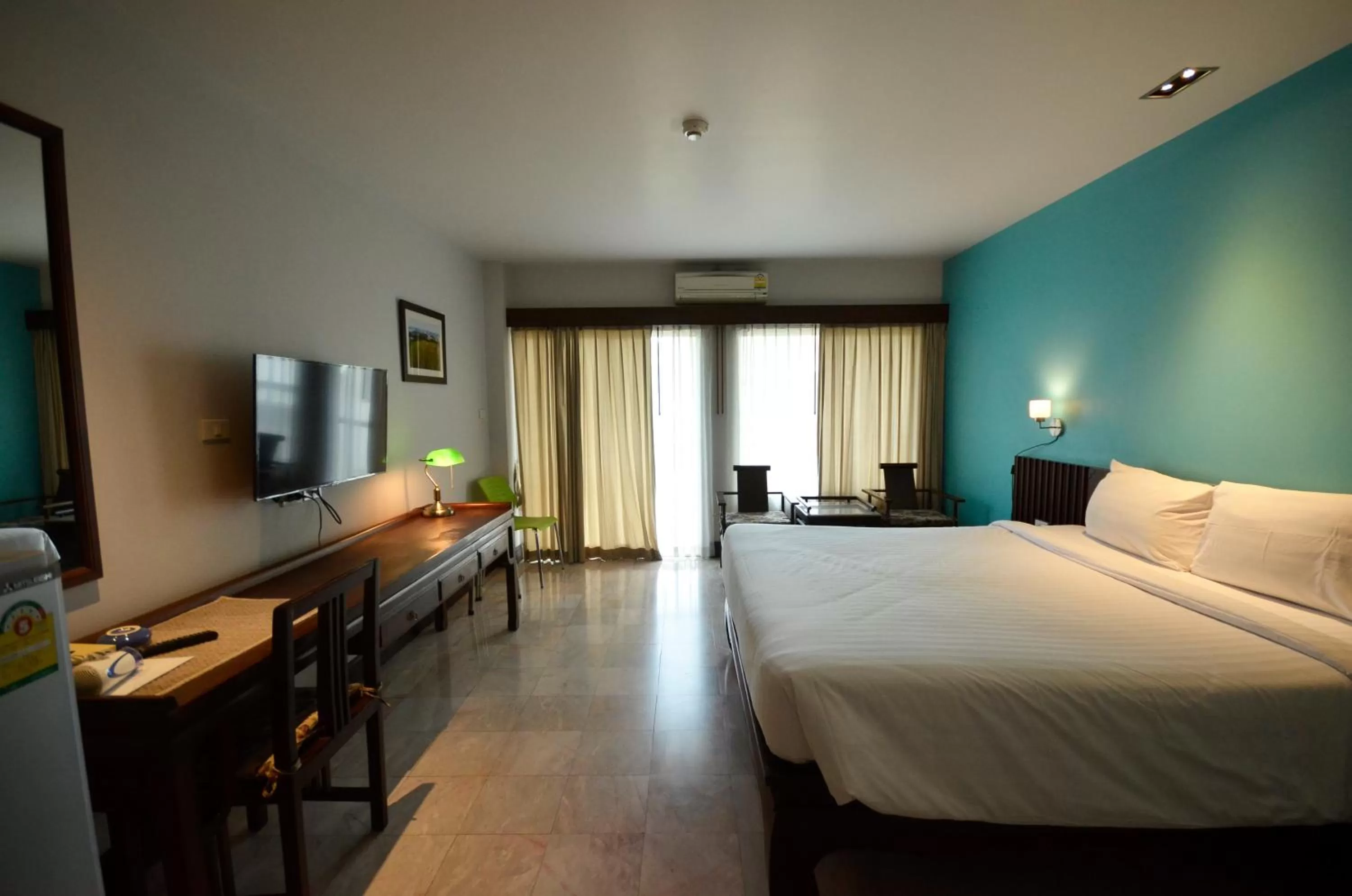 Photo of the whole room, Bed in Sakorn Residence and Hotel