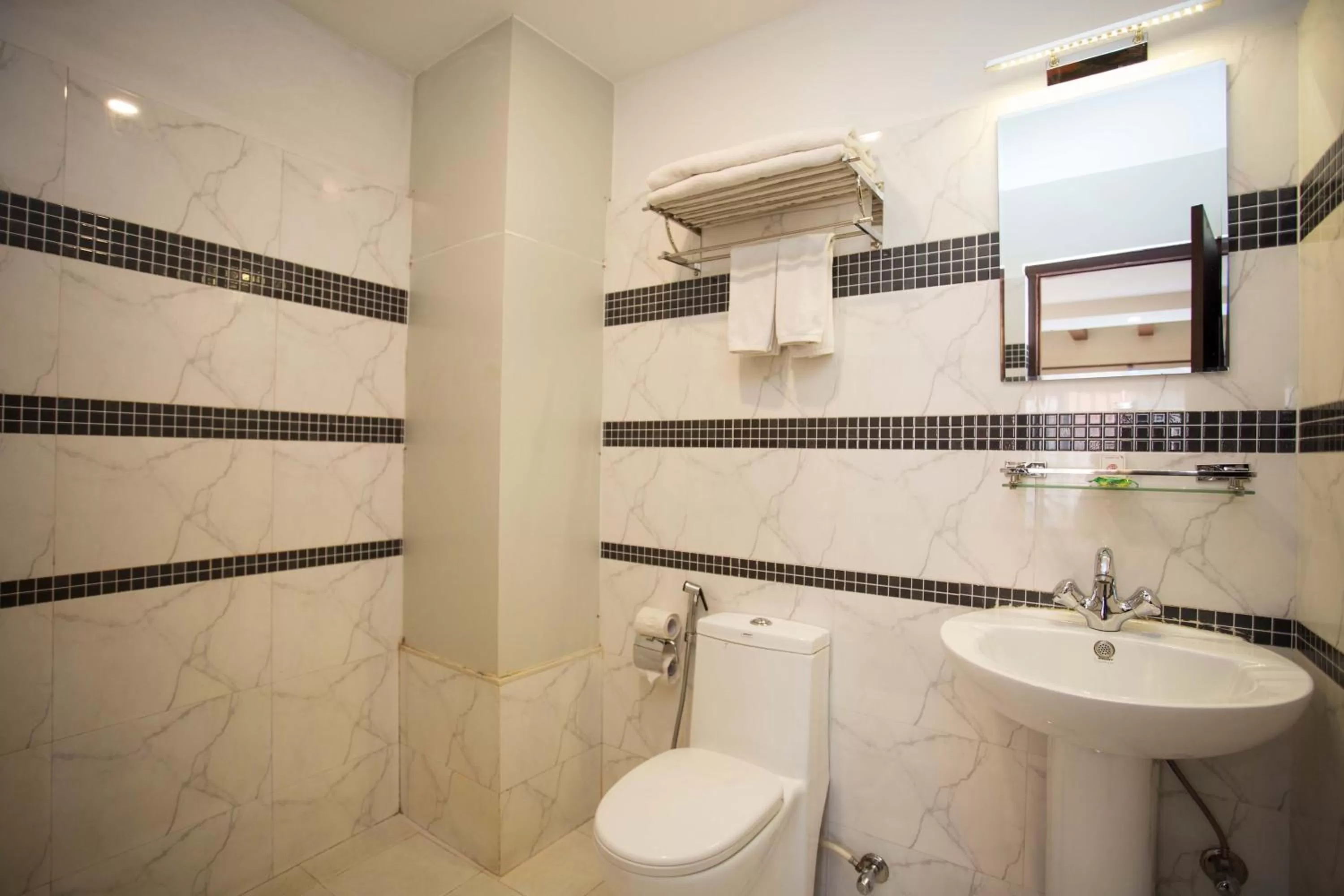 Bathroom in Hotel Jay Suites