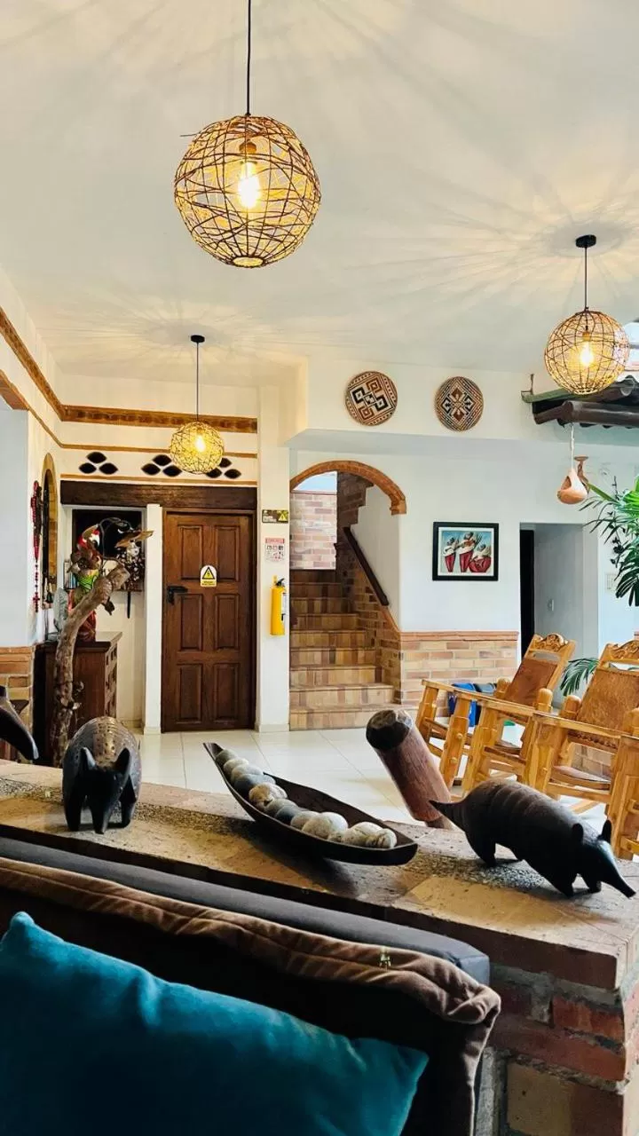 Communal lounge/ TV room in Camali Hotel