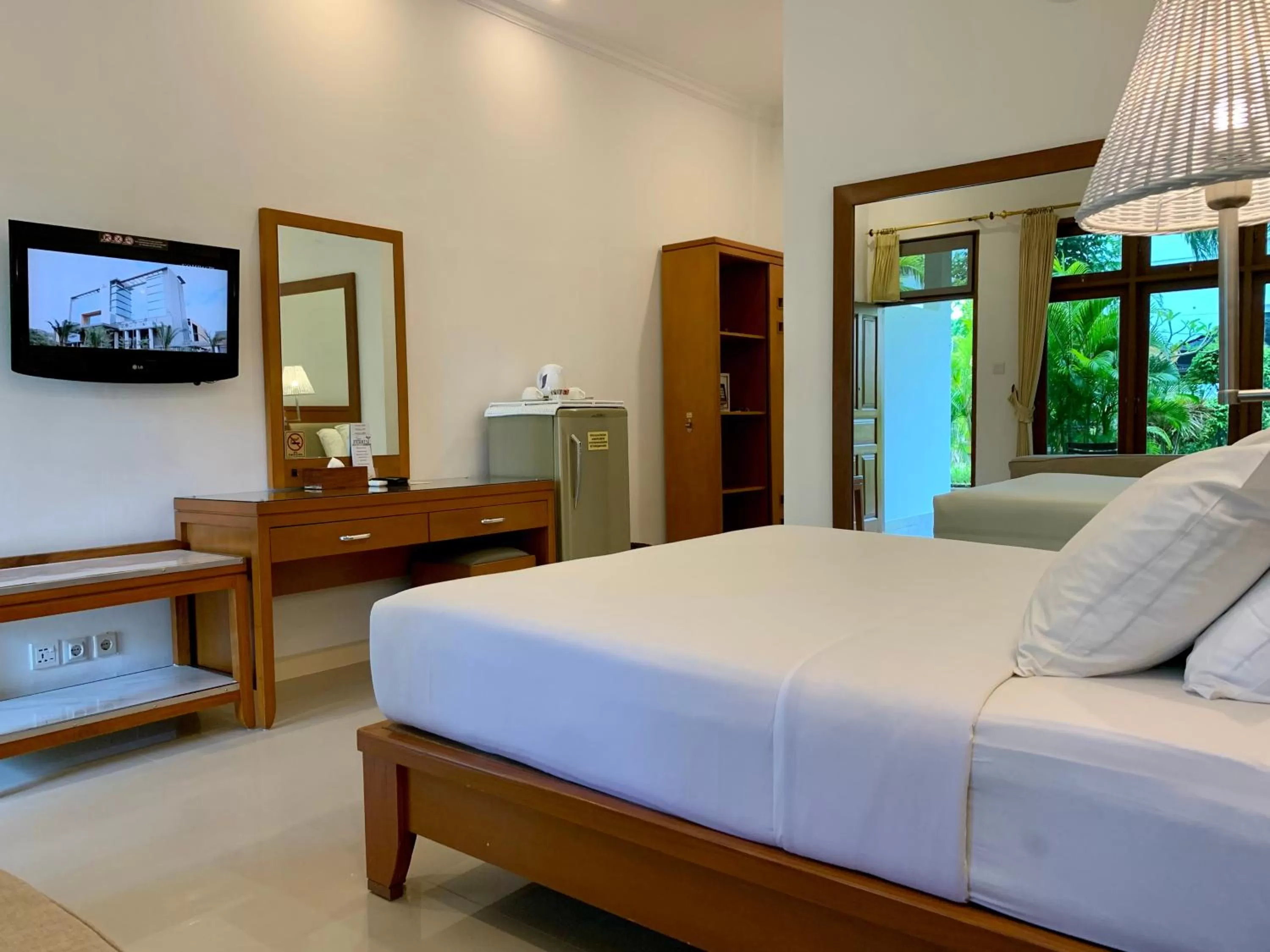 Photo of the whole room, Bed in Febri's Hotel & Spa