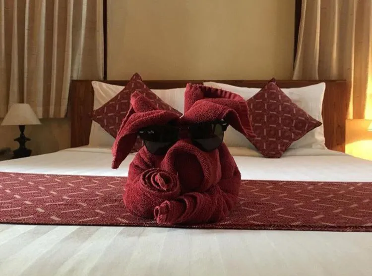 Bed in Uma Sari Cottage by Mahaputra