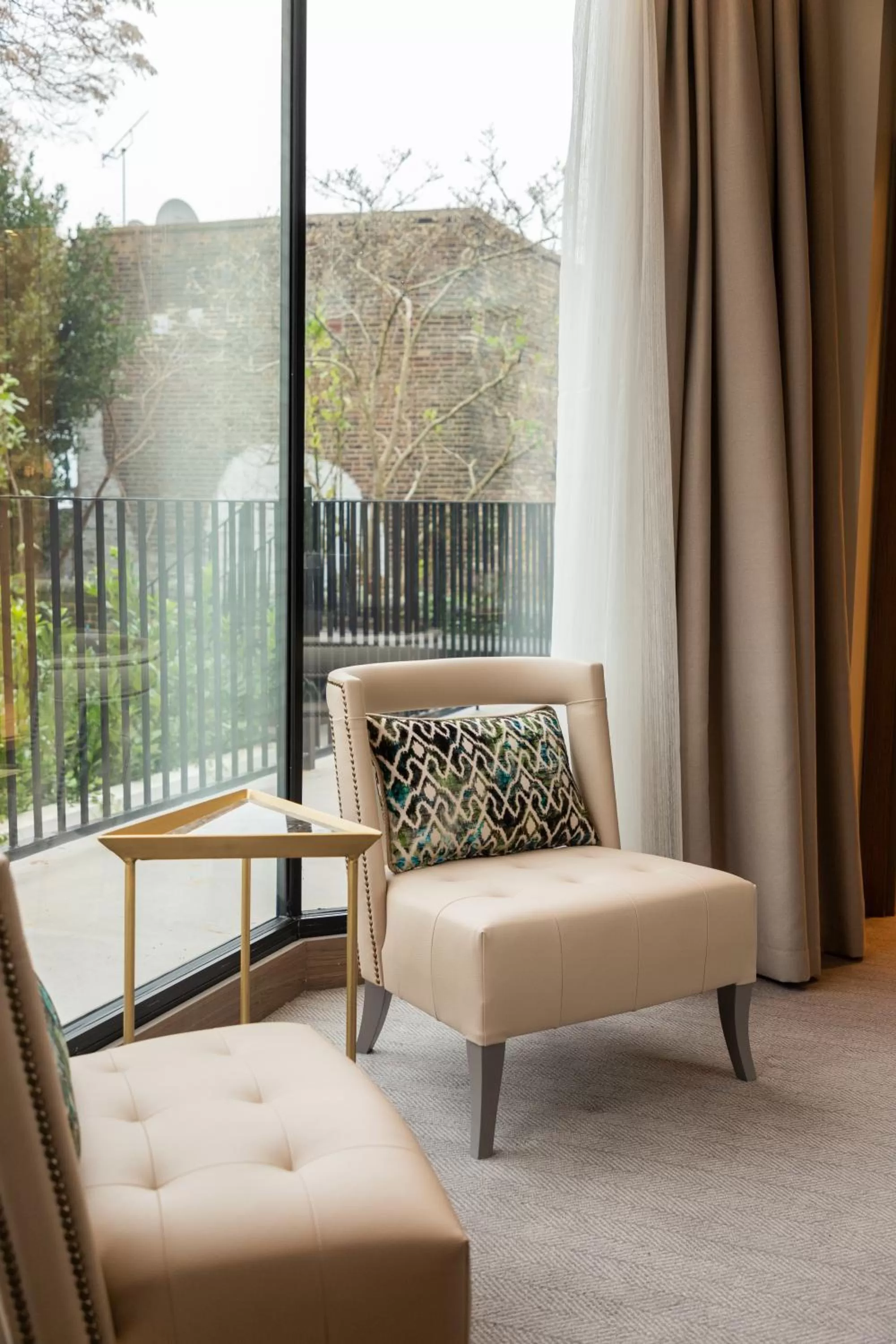 Seating area in Merit Kensington Hotel