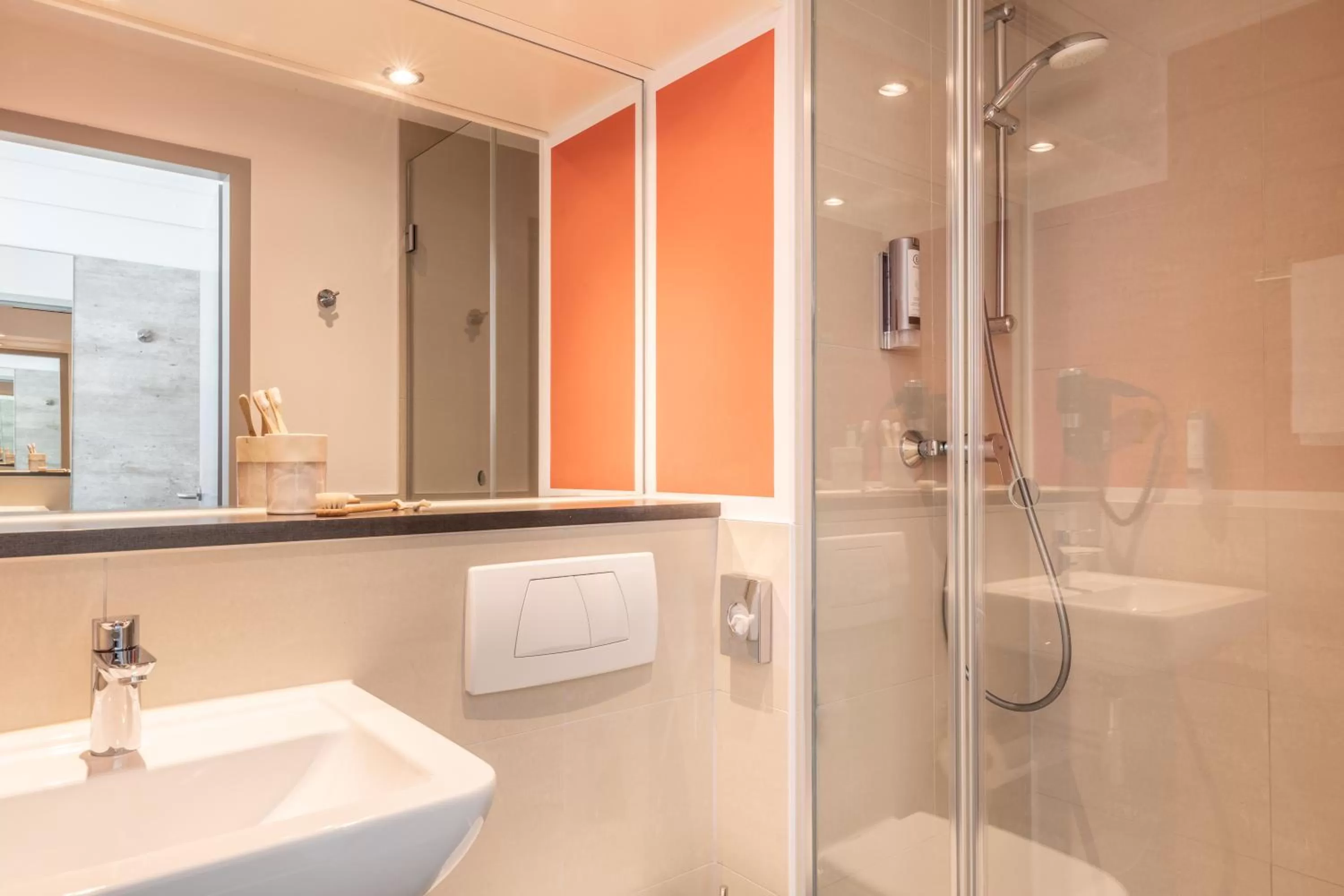 Toilet in Garner Hotel Wiesbaden City by IHG
