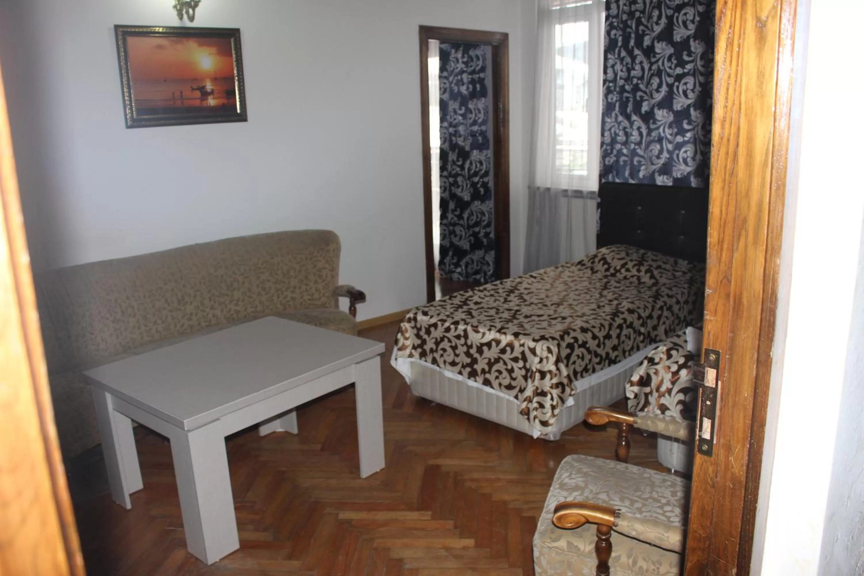 Photo of the whole room, Bed in CATTALEYA