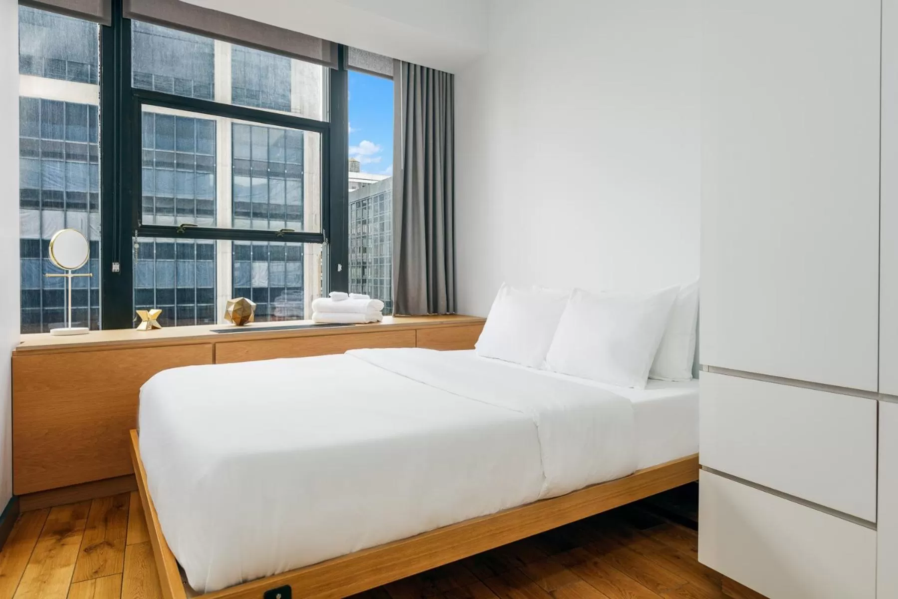 Bed in Placemakr Wall Street