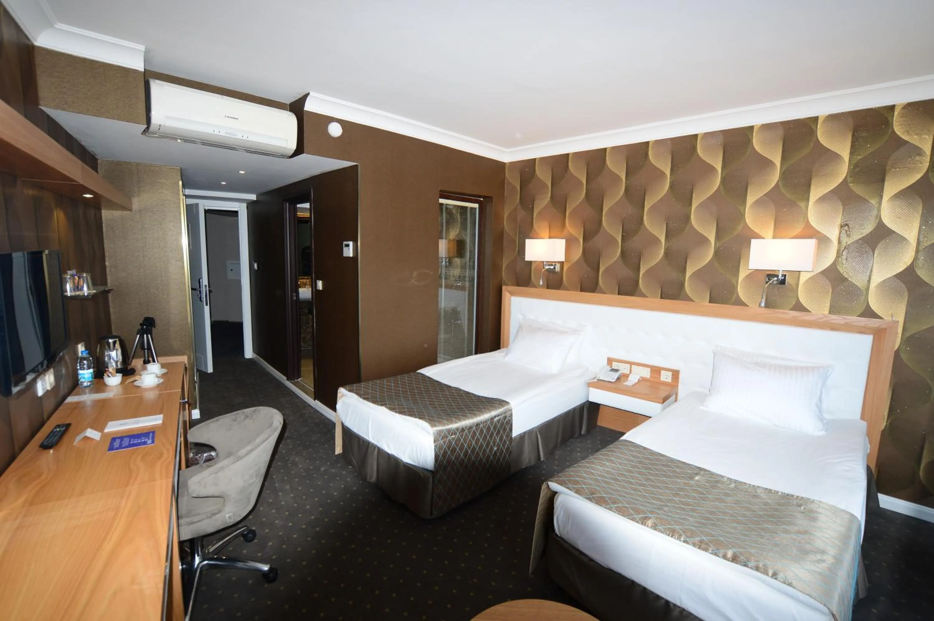 Photo of the whole room, Bed in Akol Hotel