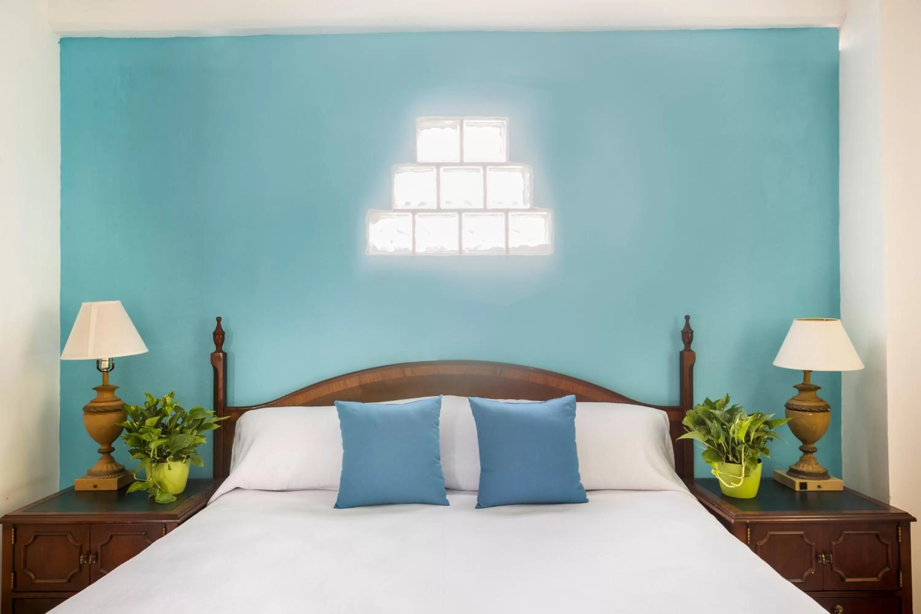 Bed in Hotel Pueblito Vallarta