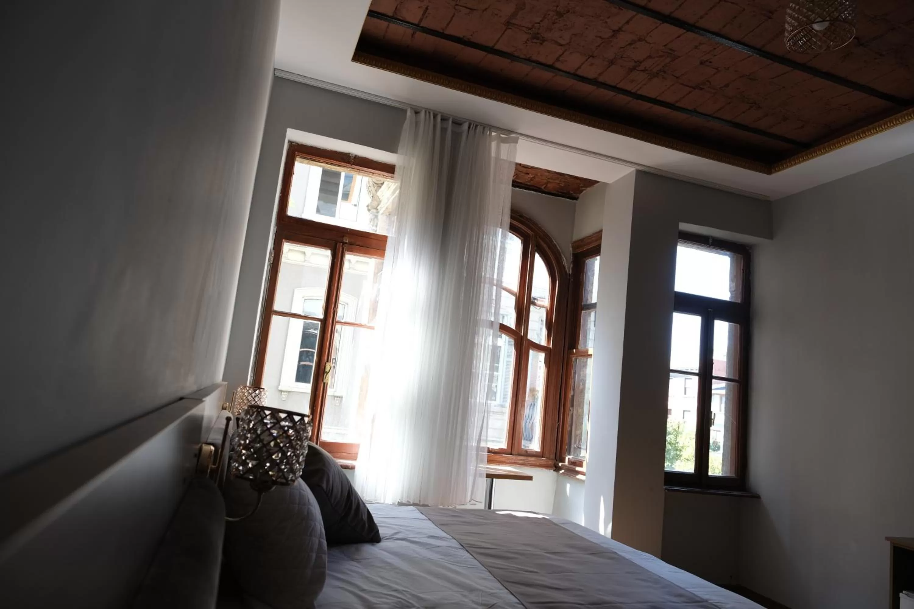 Bed in Adamantides Hotel