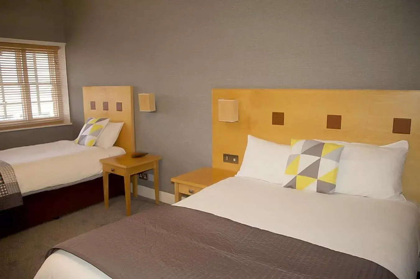 Family Room (3 Adults) in The Warwick Arms Hotel - The Coaching Inn Group Family Room (3 Adults) in The Warwick Arms Hotel - The Coaching Inn Group