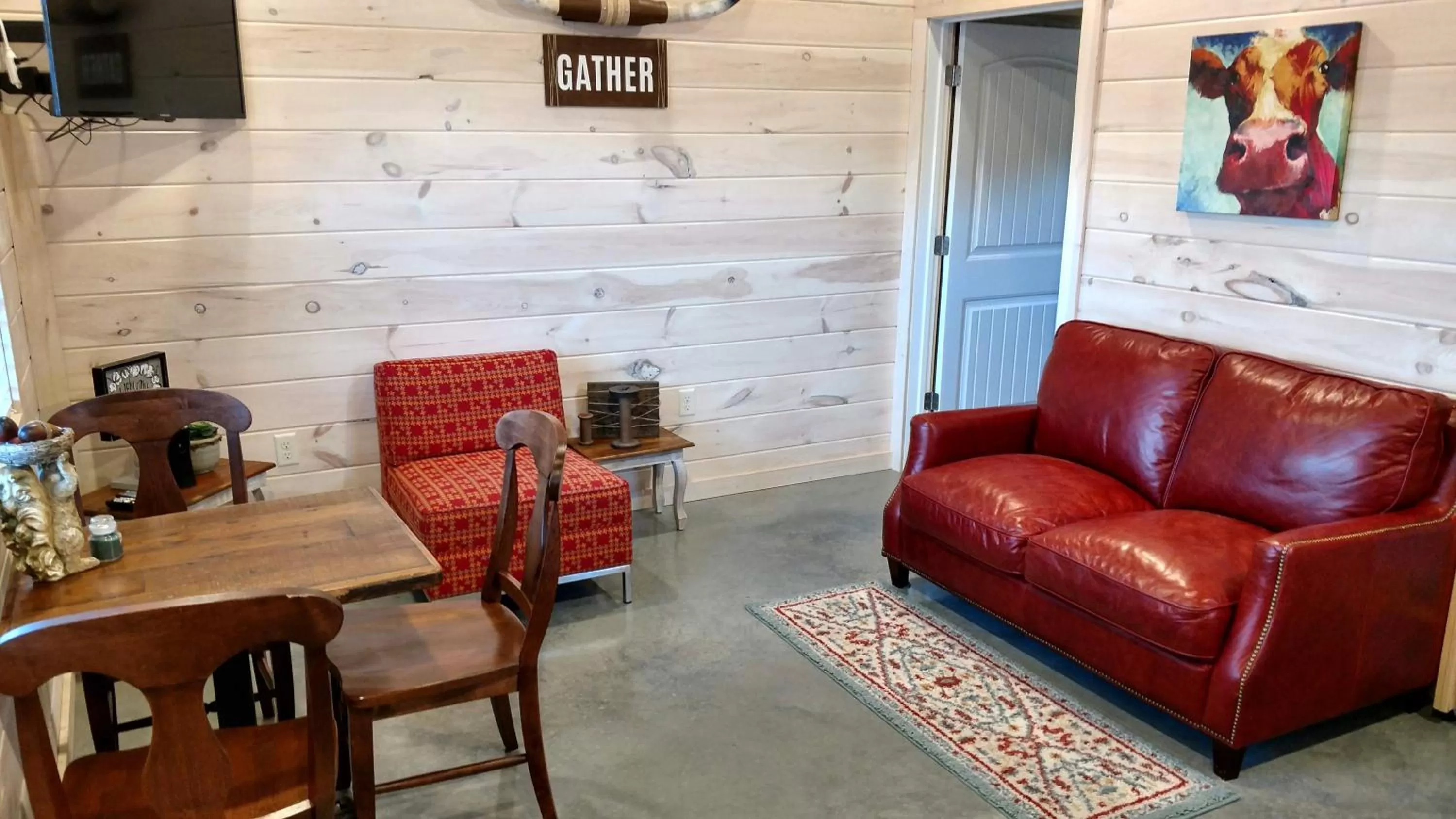Seating area in Knotty Squirrel Cabins