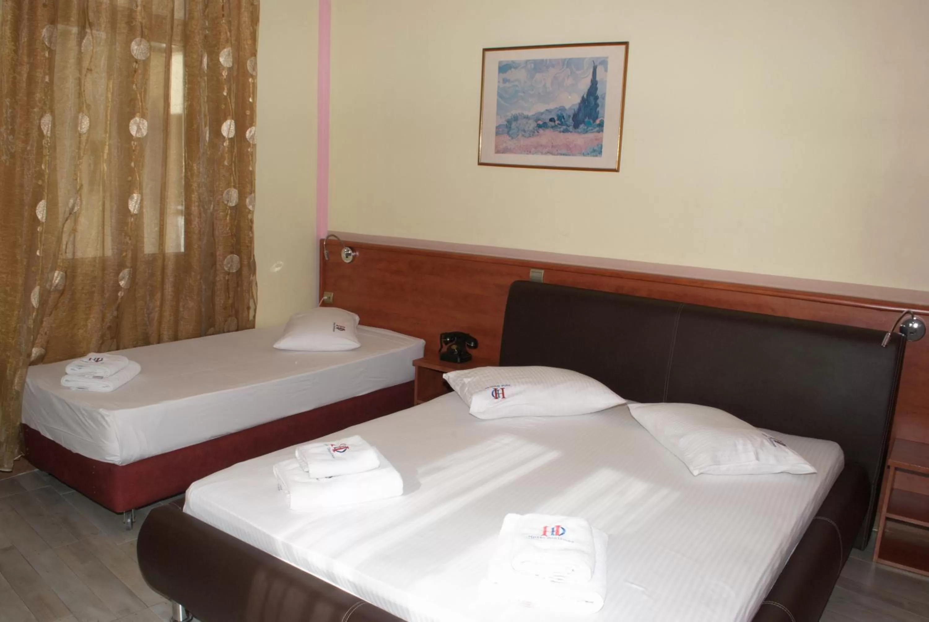 Bed in Diethnes Hotel