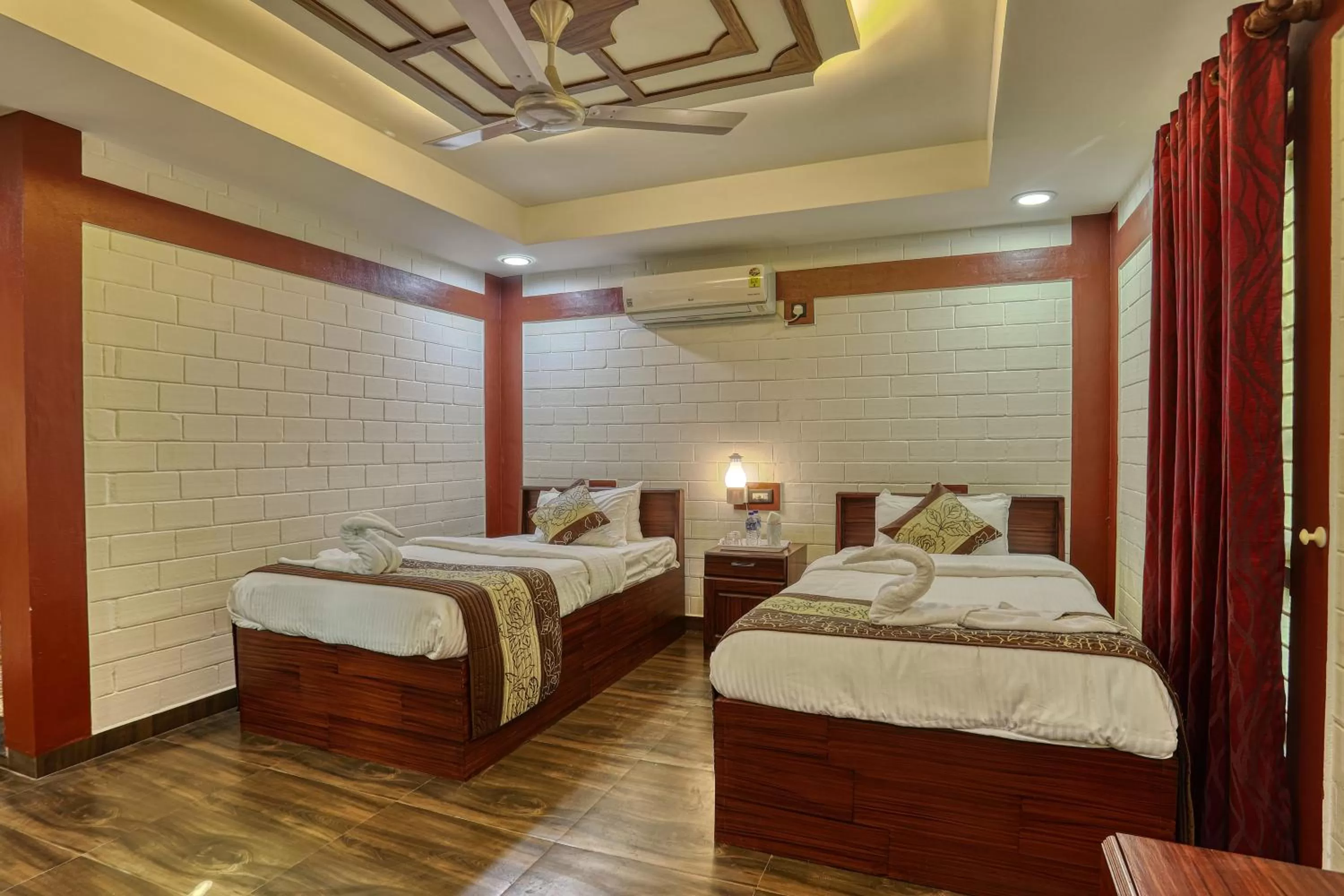 Bed in LEISURE VALLEY BEACH RESORT