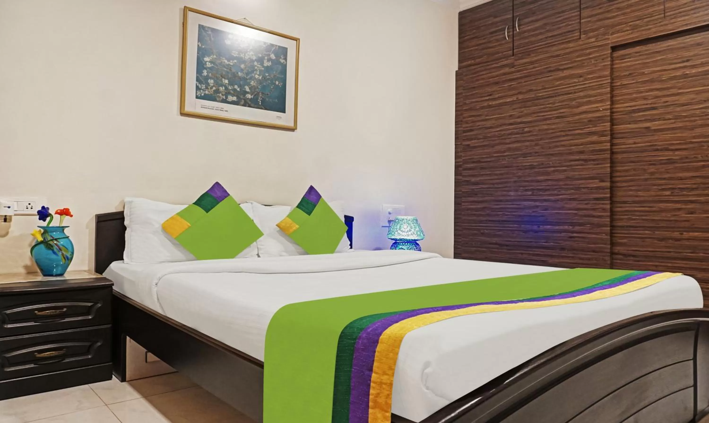 Bedroom, Bed in Treebo Excellent Home