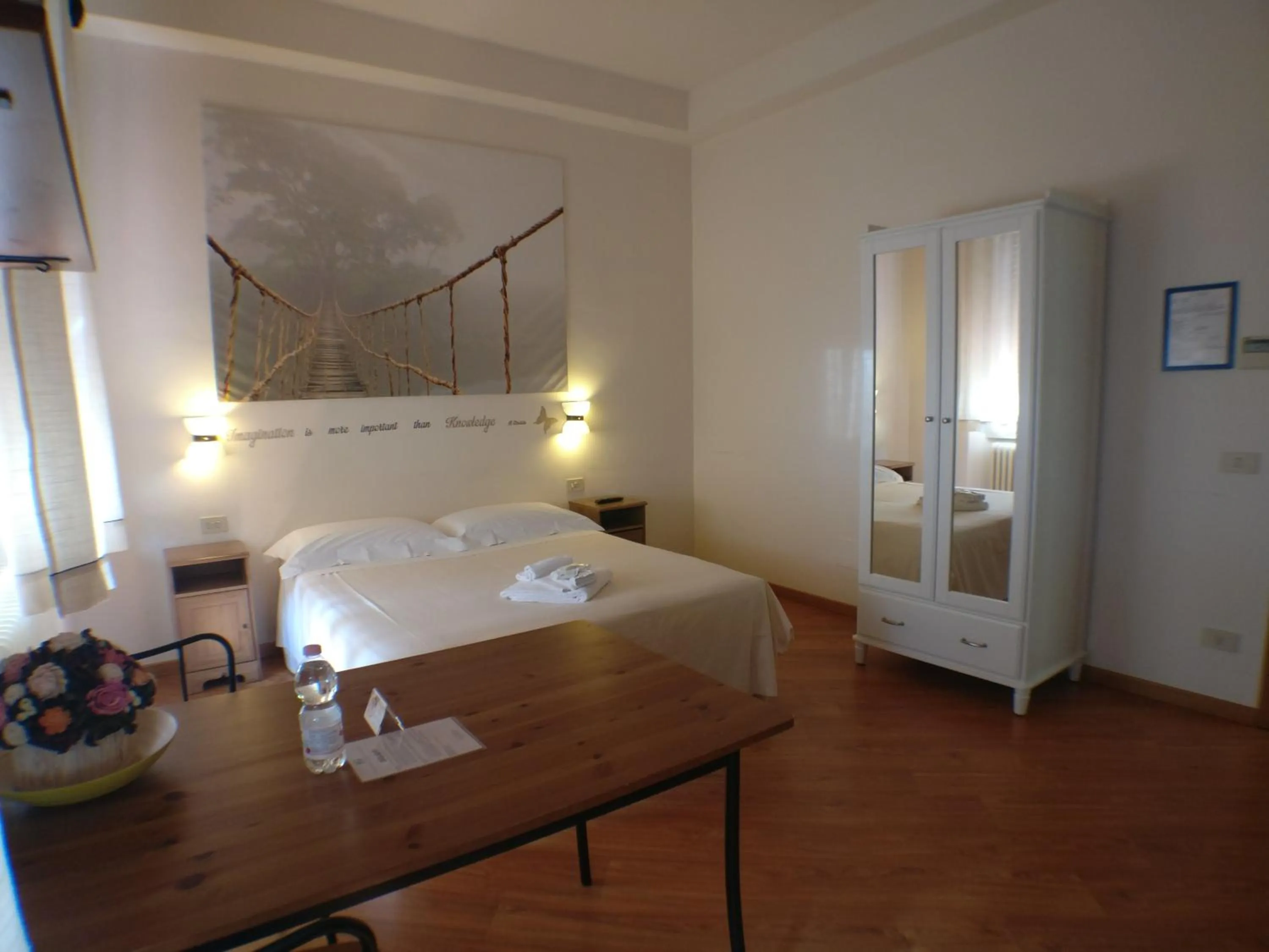 Bed in Il Girasole High Quality Inn