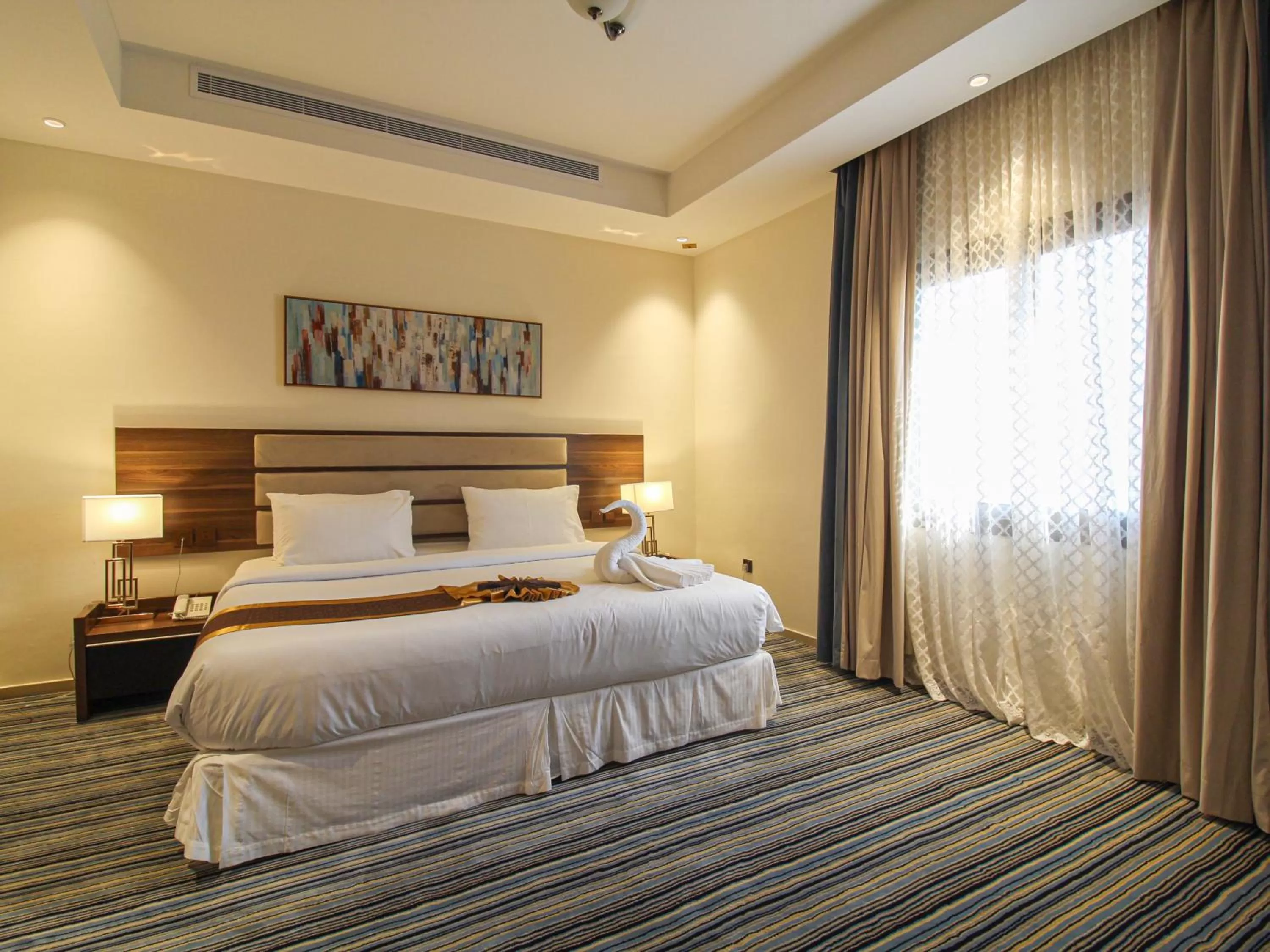 Bed in Friesian Hotel Suites