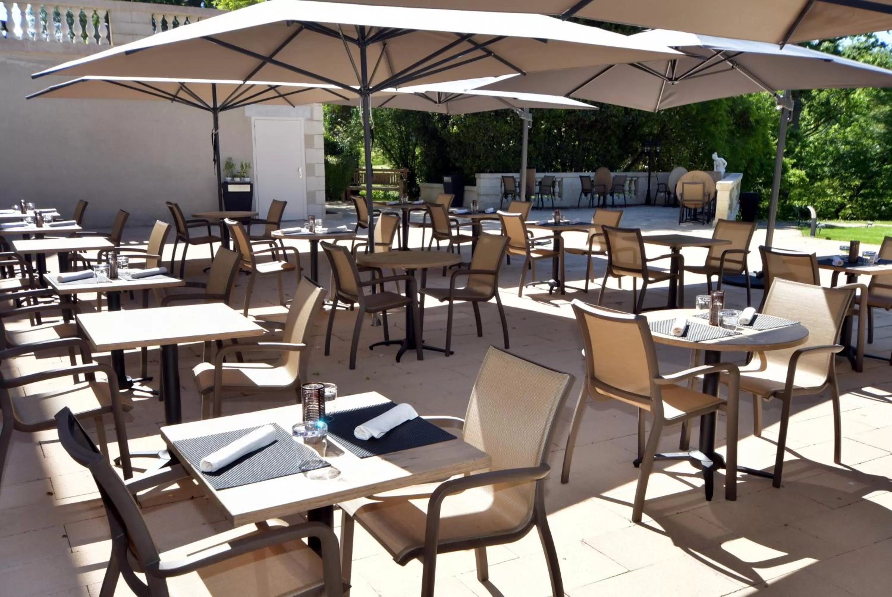 Patio in Logis Hotels - Château Saint Marcel