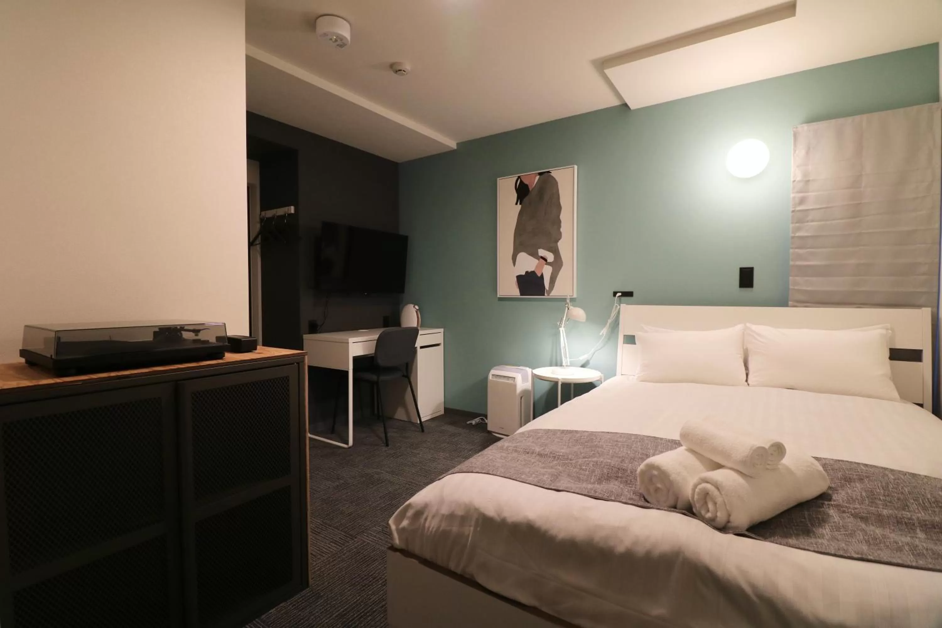 Bed in TAKETO STAY PREMIERE SAPPORO Eki