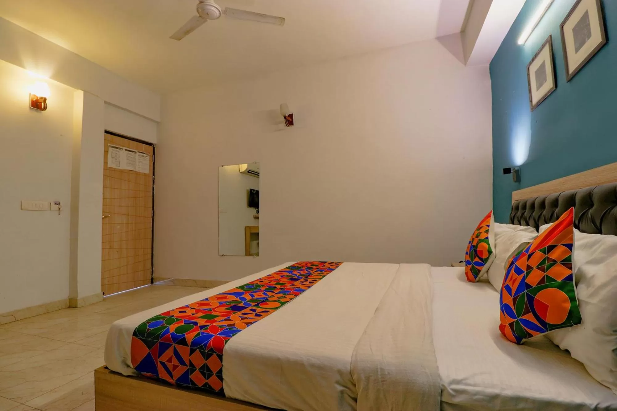 Bed in FabHotel Happy Inn