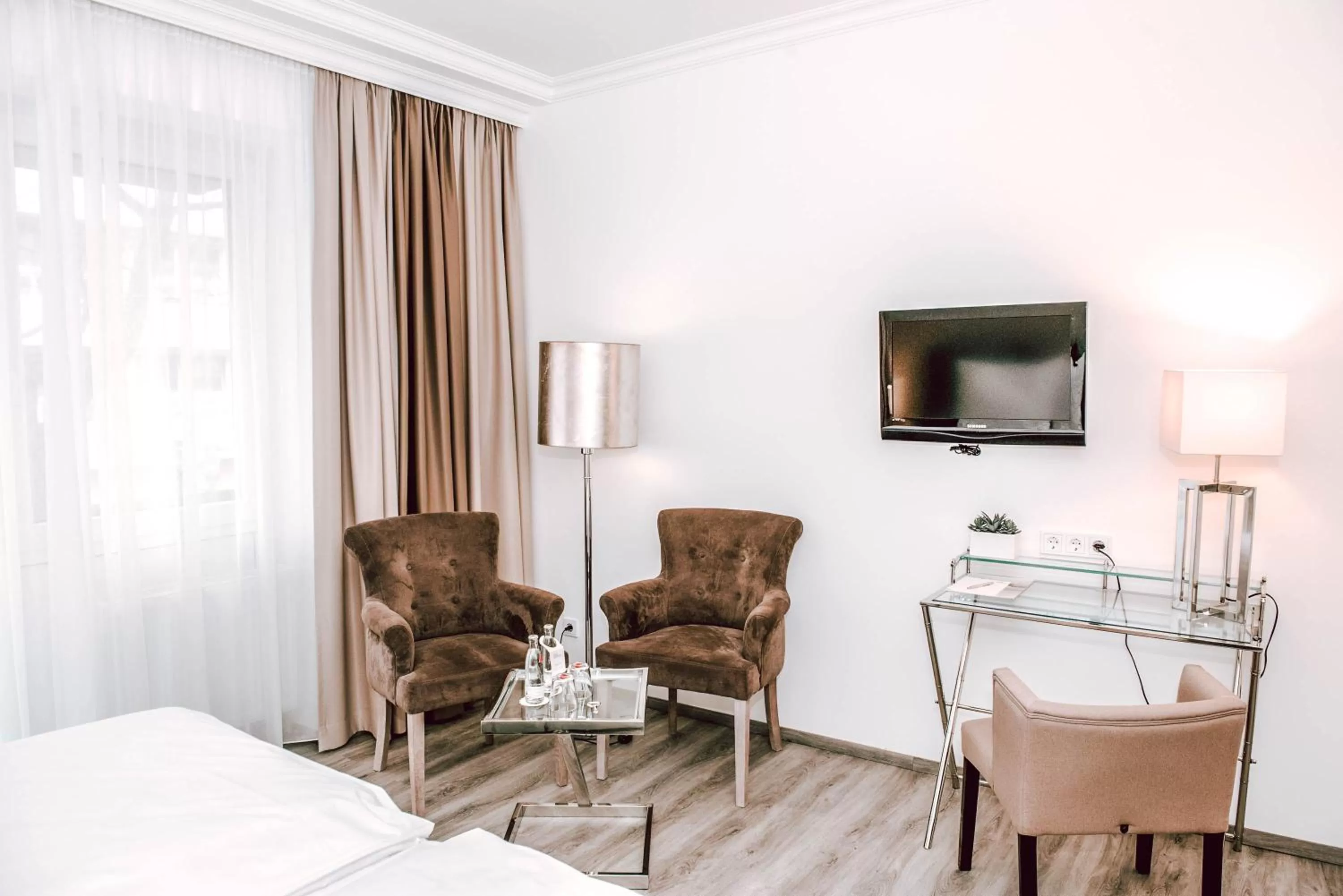 Seating area in Concorde Business Boutique Hotel