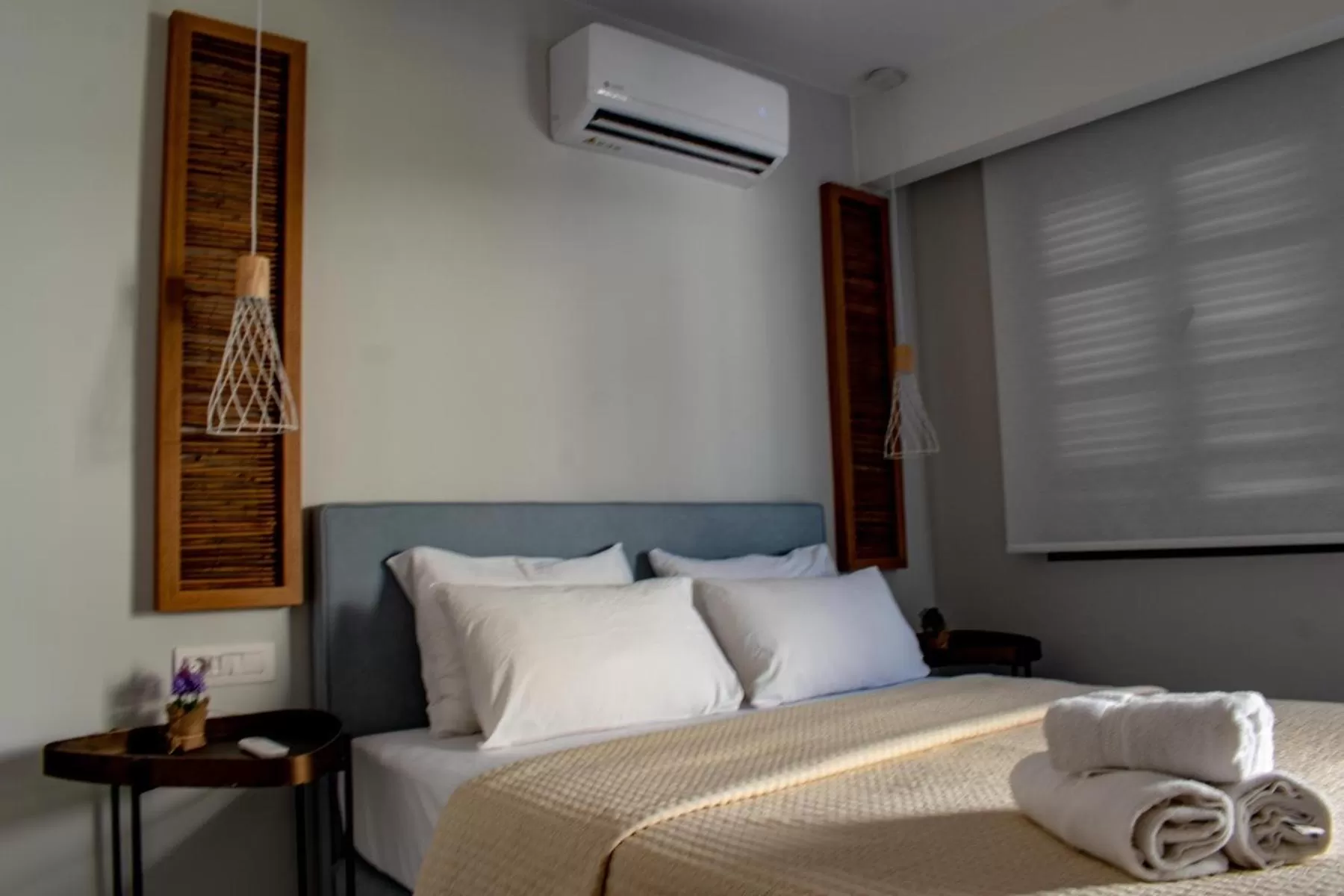 Bed in Ikaros Art Hotel