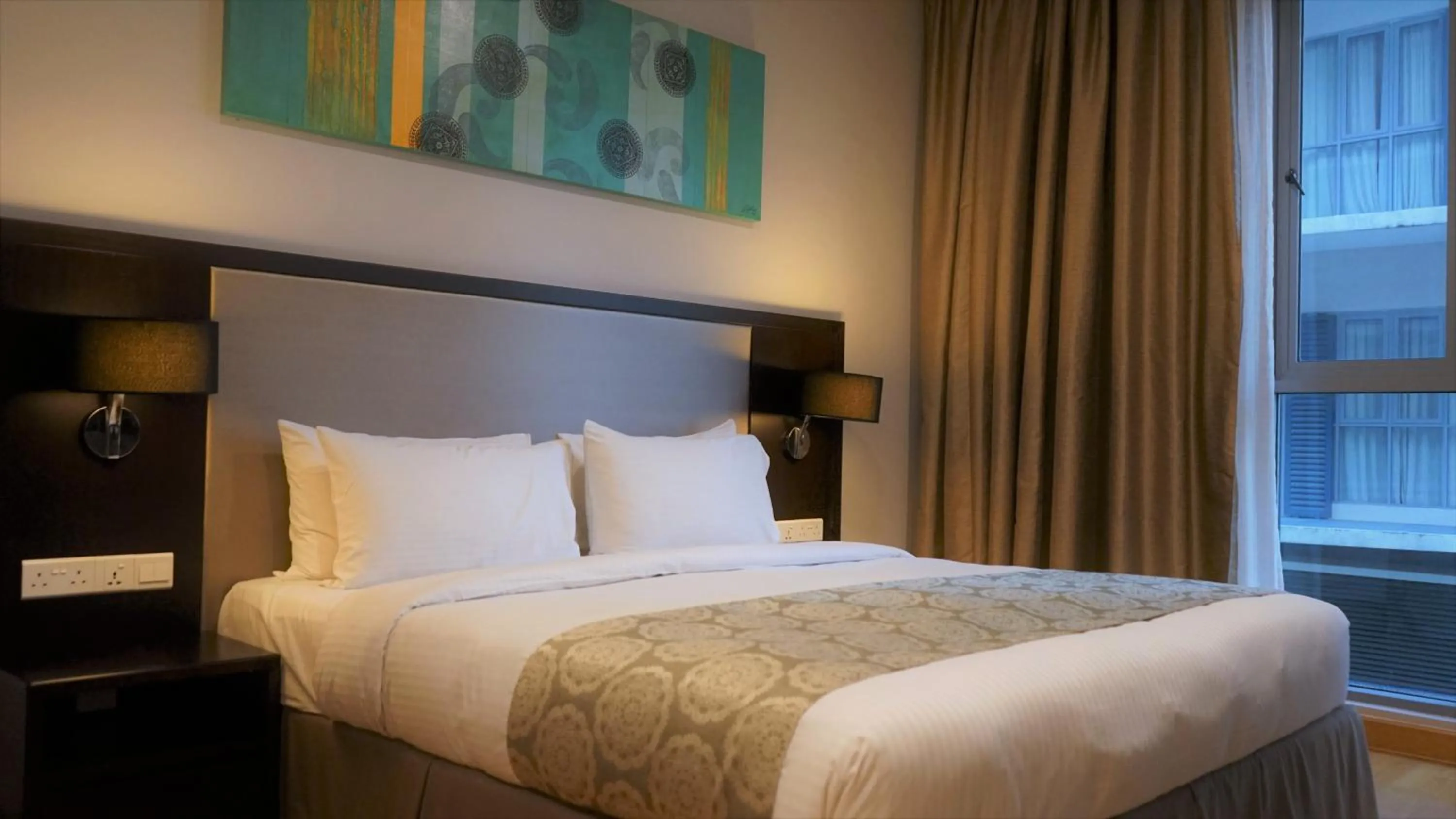 Bed in Trinidad Suites Johor, Trademark Collection by Wyndham