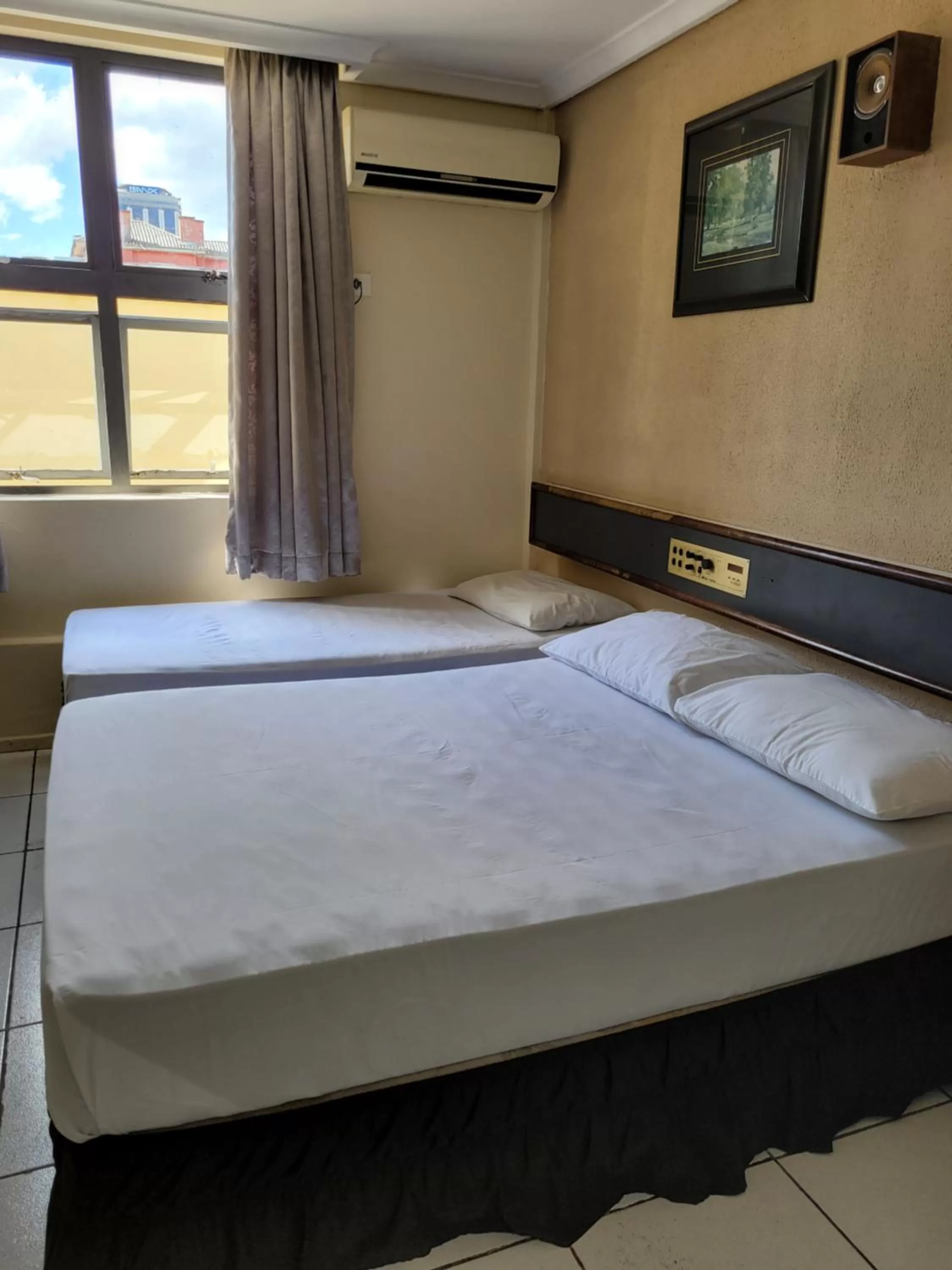 Bed in Hotel Estação Express