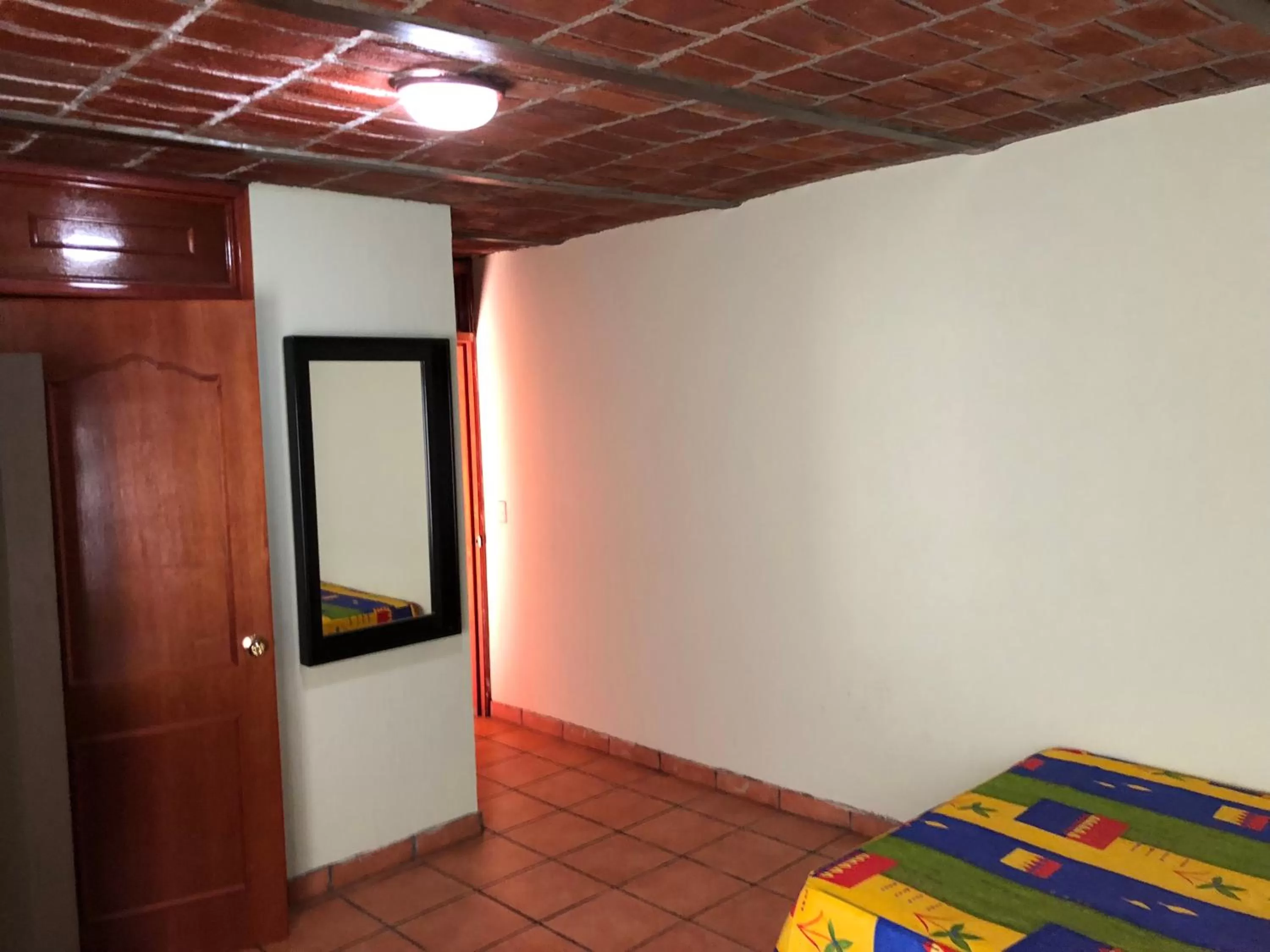 Photo of the whole room, TV/Entertainment Center in Hotel Hacienda el Ceboruco