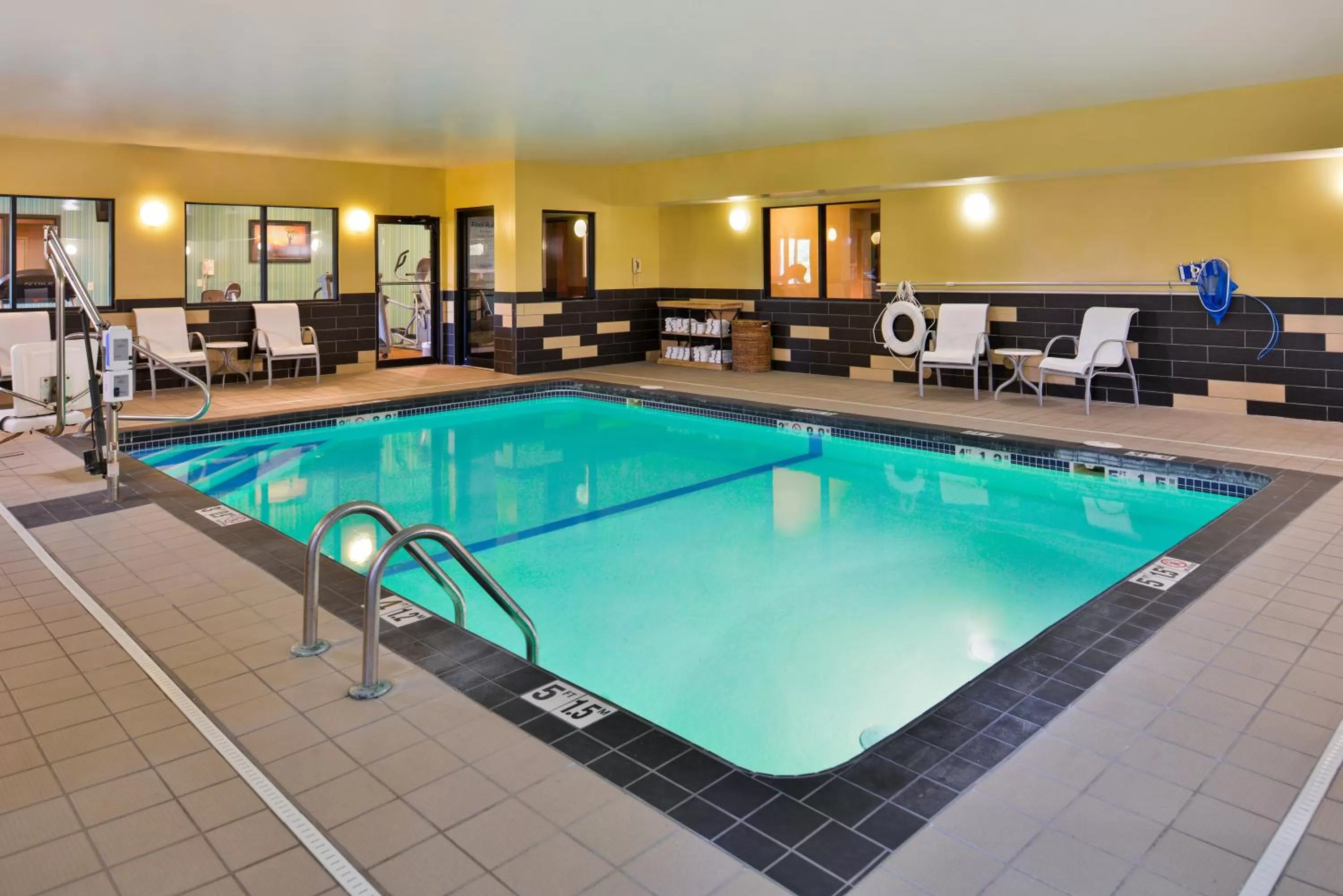 Swimming pool in Holiday Inn Express & Suites Topeka West I-70 Wanamaker by IHG