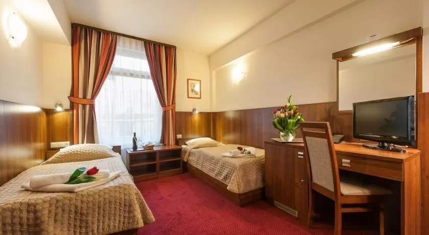 Bed in Hotel Alexander