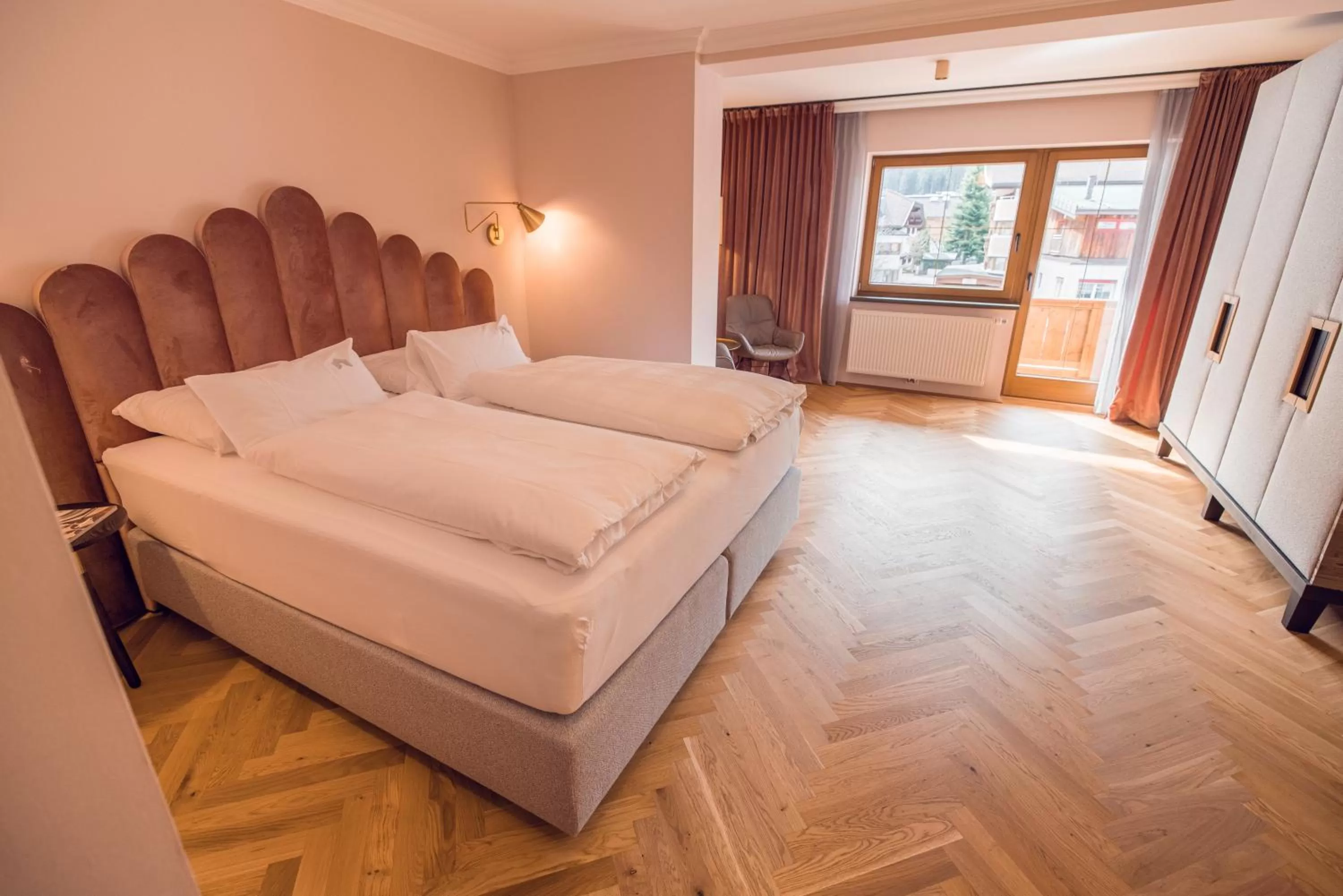 Bed in Alpine Hideaway ZILLERTALERHOF - 4 Sterne Superior