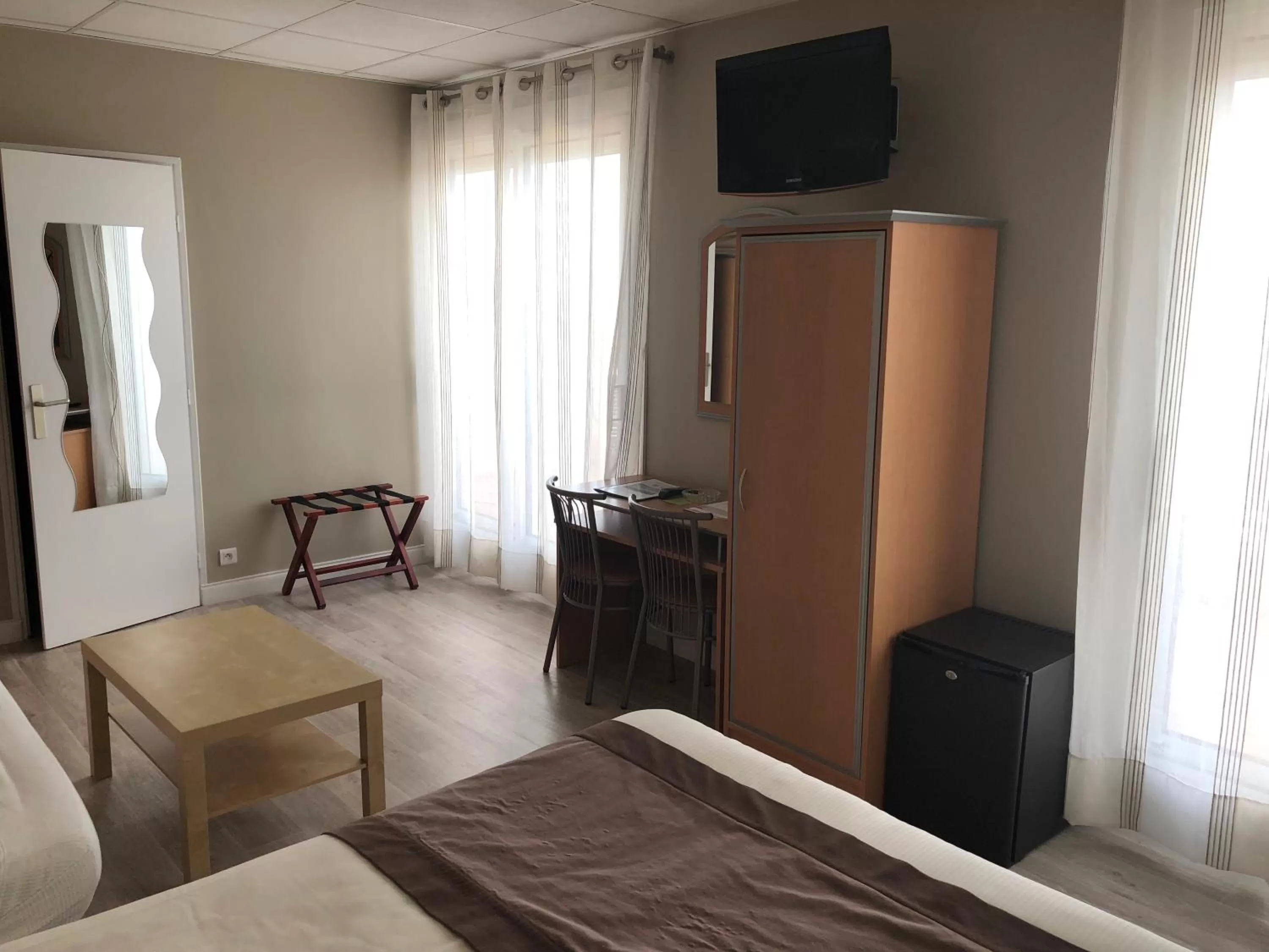 Photo of the whole room, Bed in Logis Hotel Restaurant le Mirador