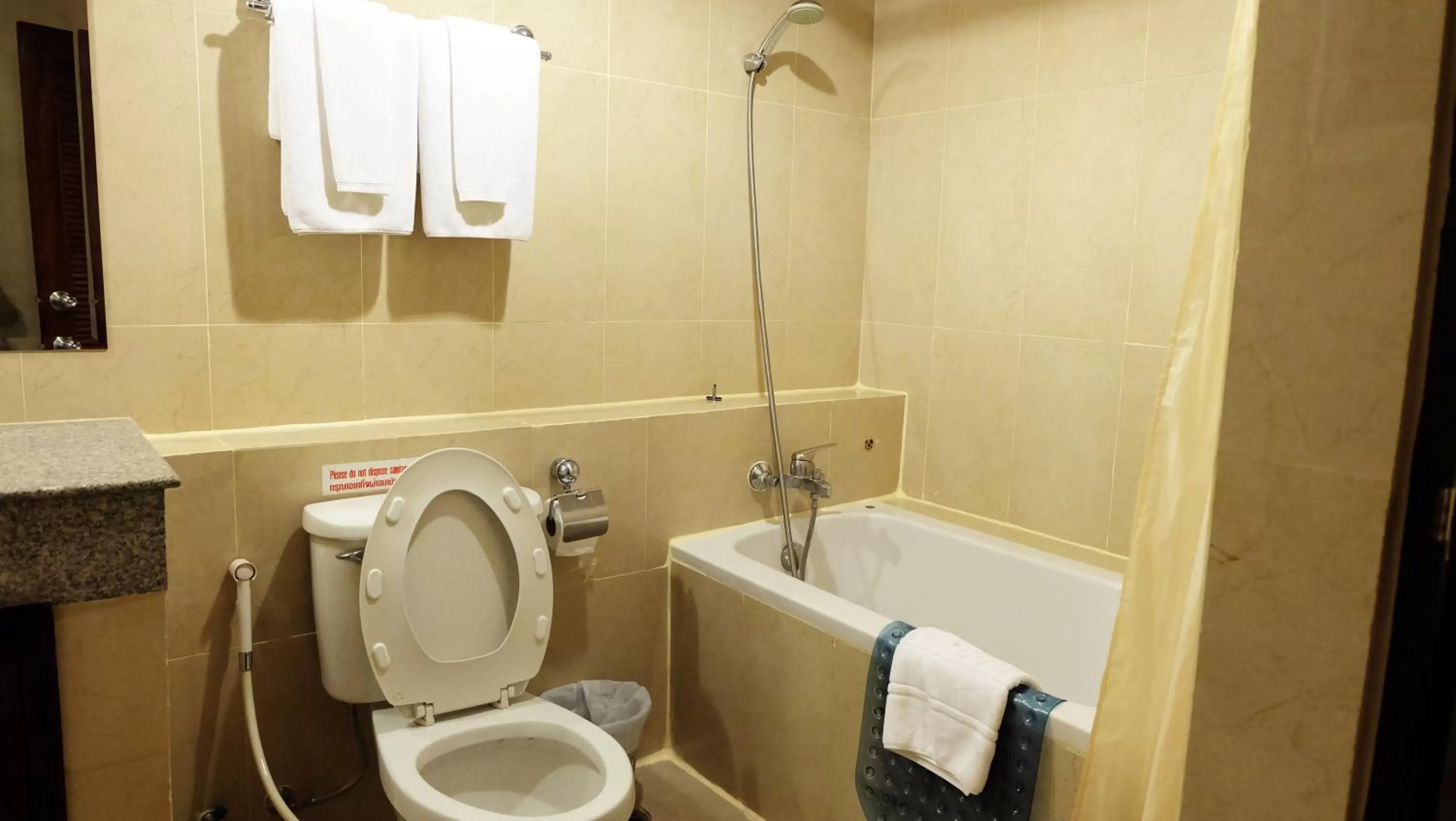 Bathroom in Grand Business Inn