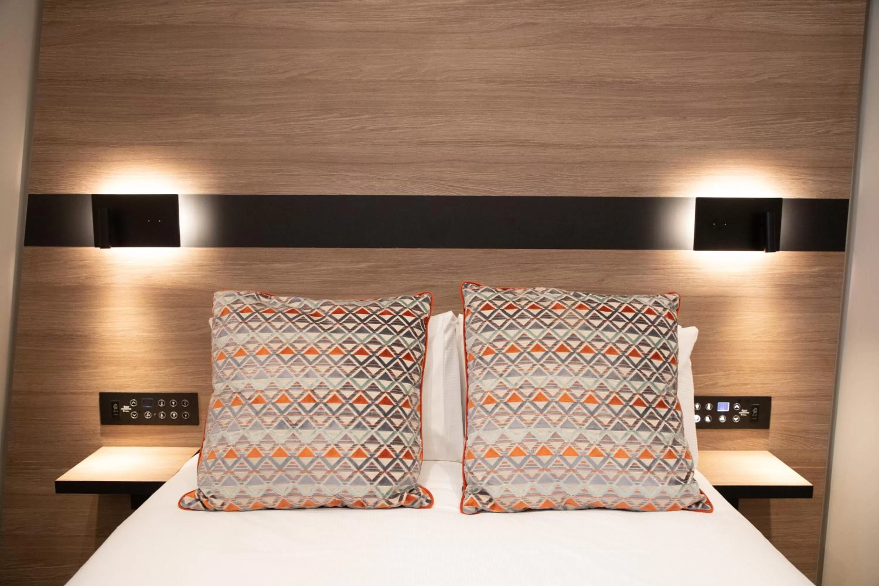 Bed in Merit Kensington Hotel