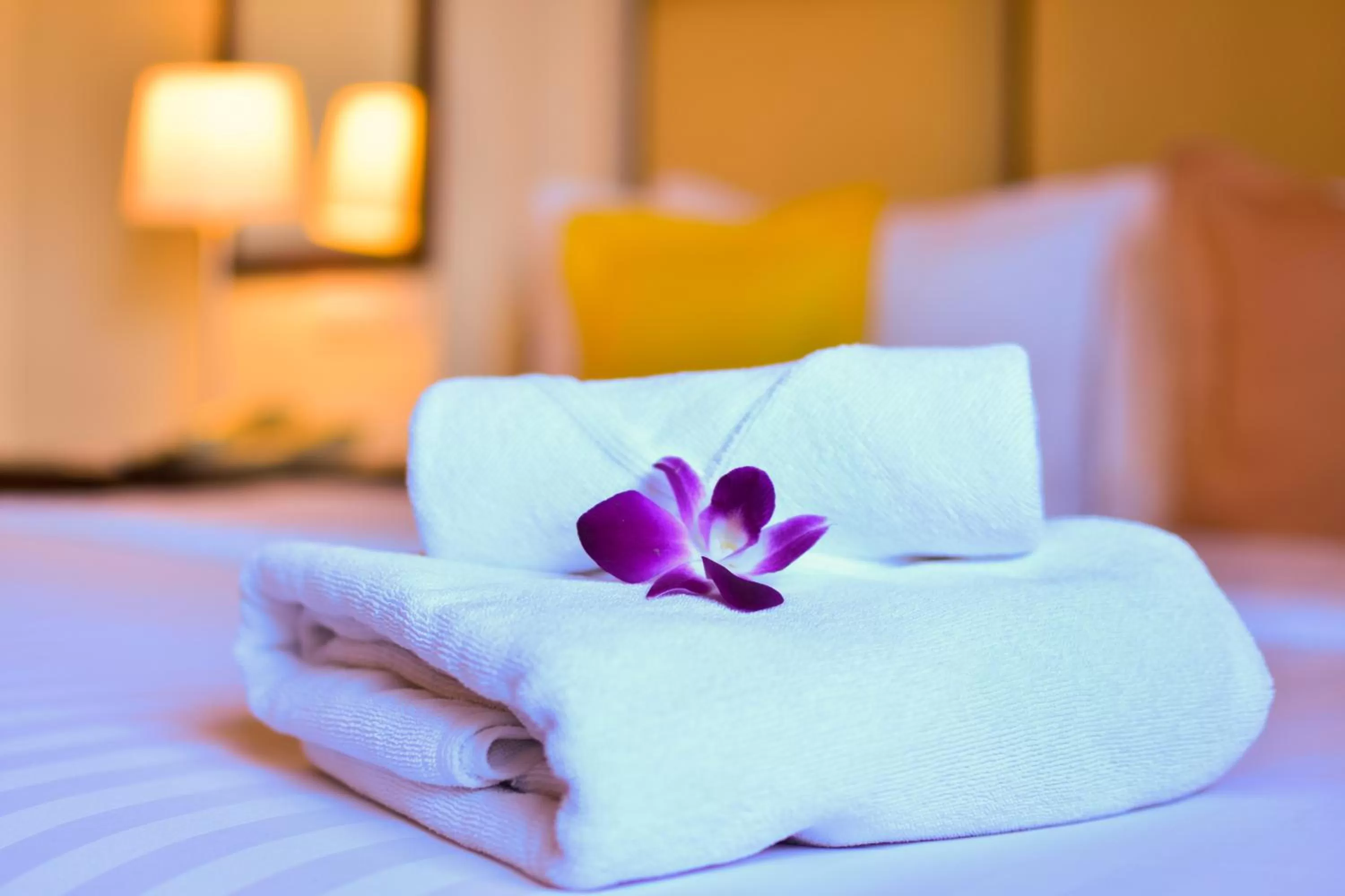 towels, Bed in Grand Business Inn