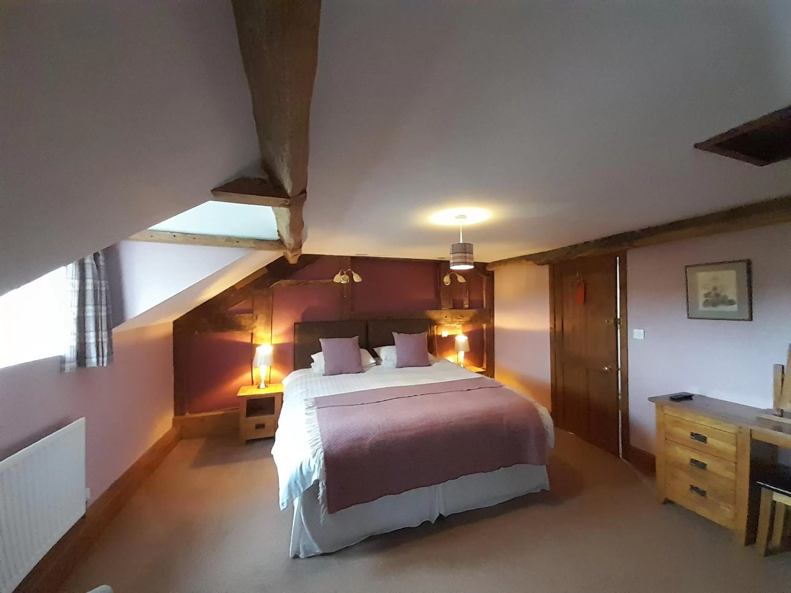 Bed in The Dolfor Inn