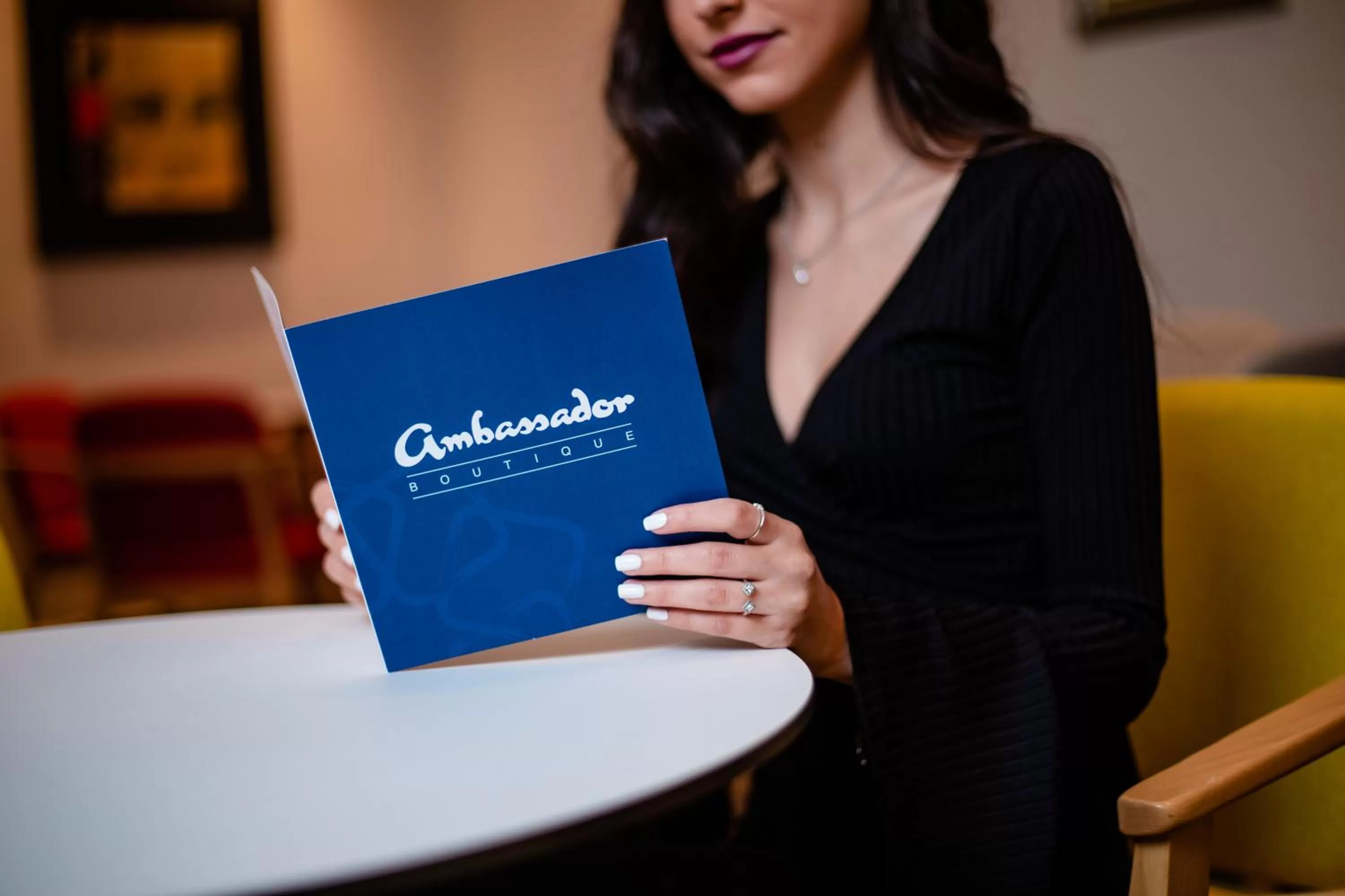 Property logo or sign in Ambassador Boutique Hotel