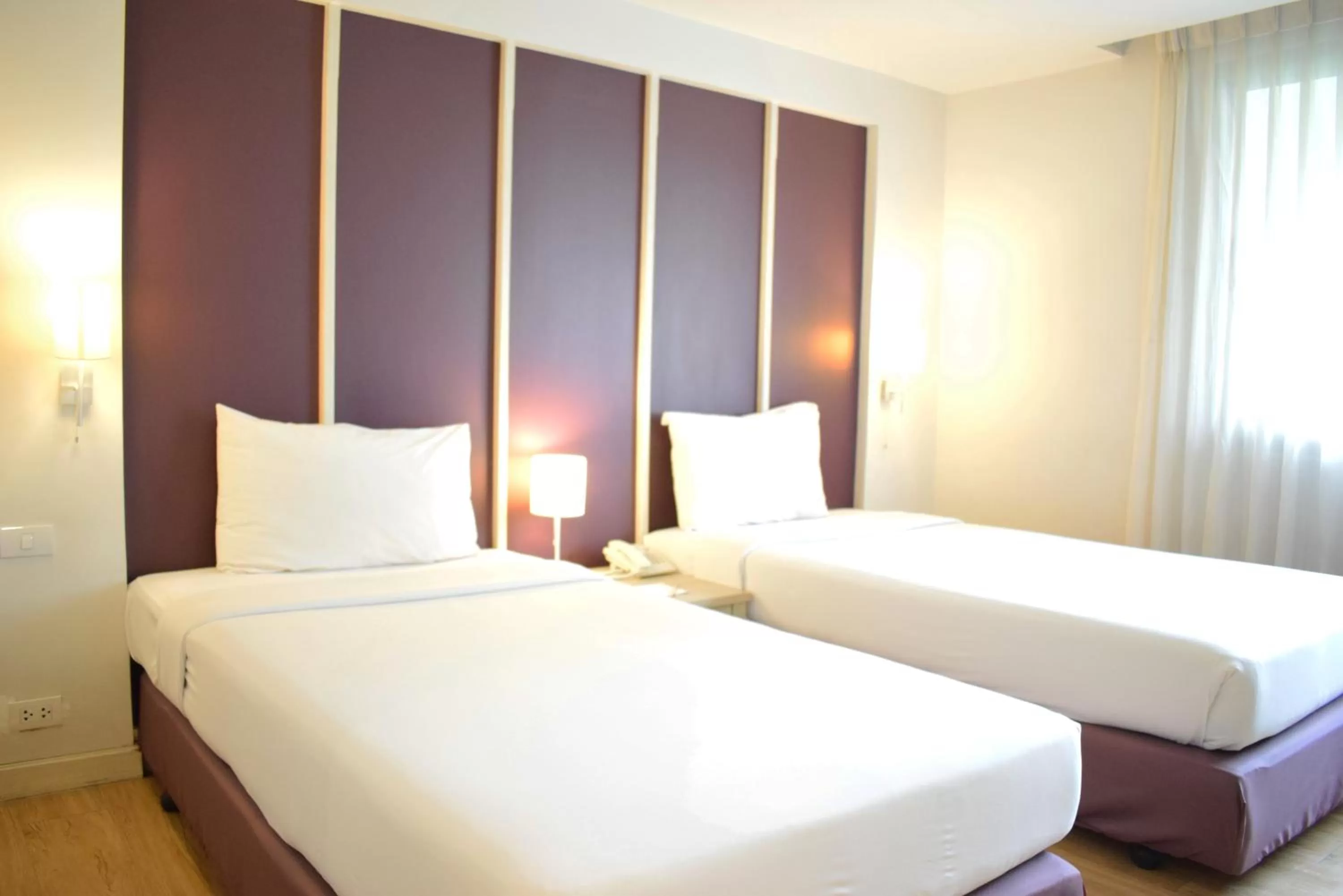 Bed in Trang Hotel Bangkok - SHA Plus