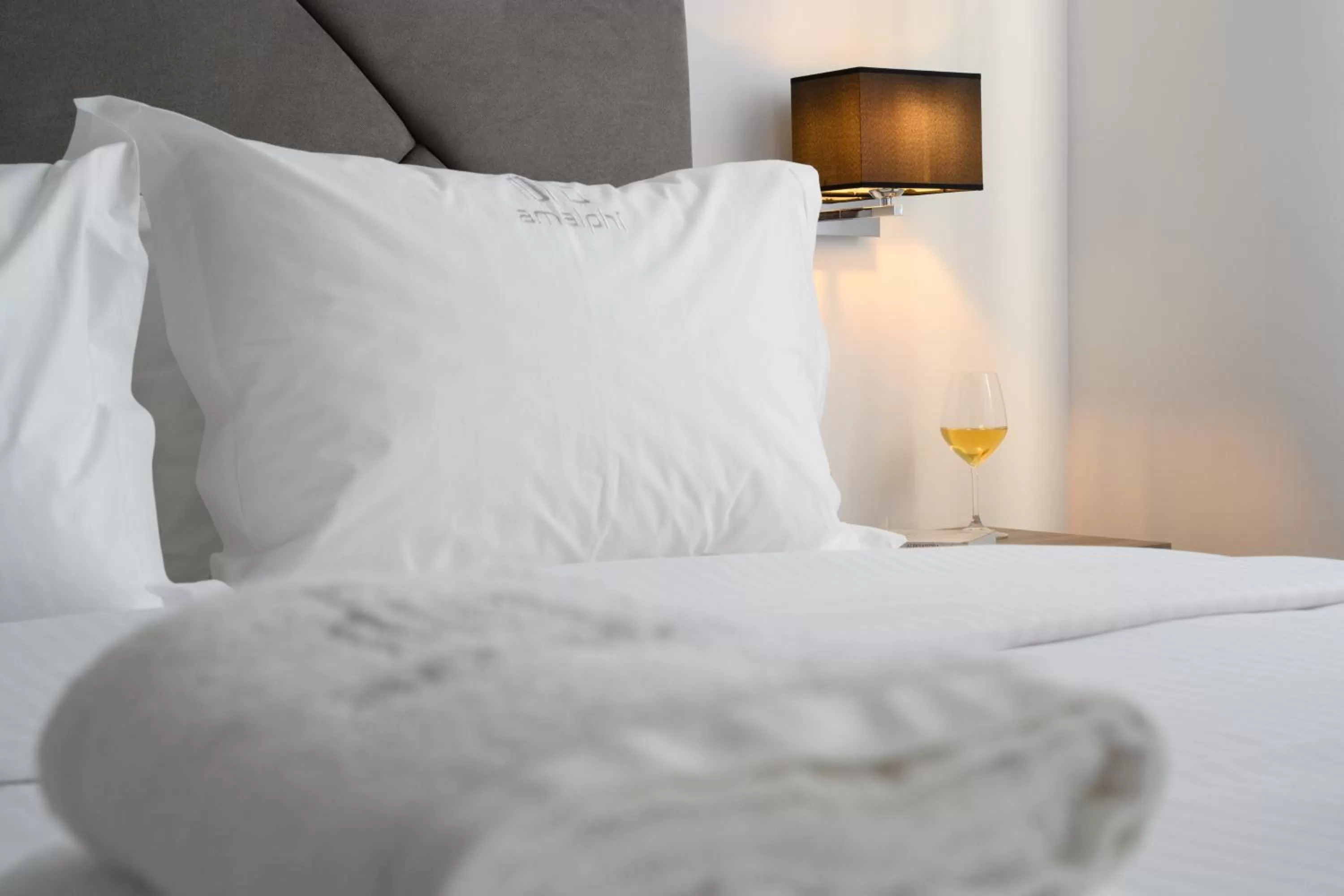 Bed in AMALPHI Corfu City Living