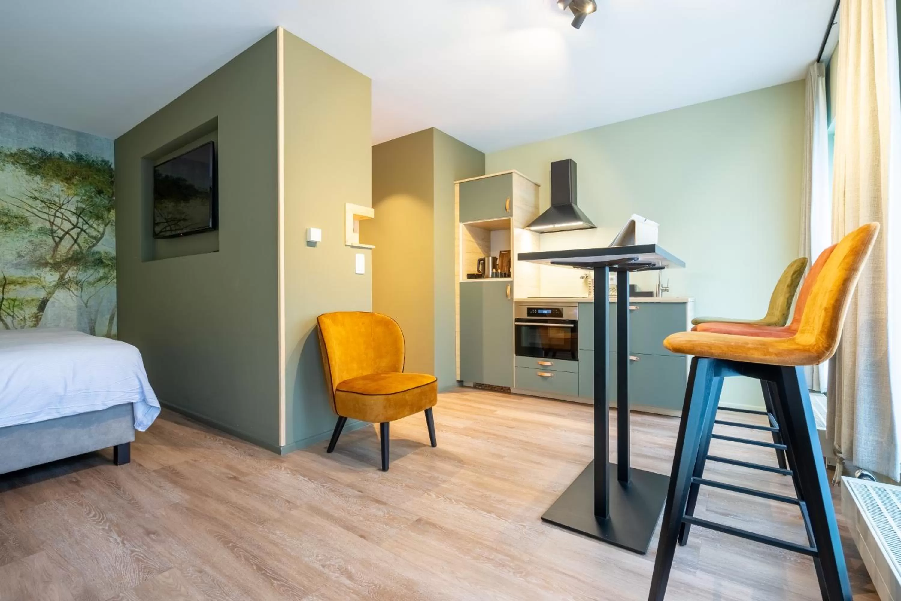 Kitchen or kitchenette, Bed in Appart hôtel En Ville