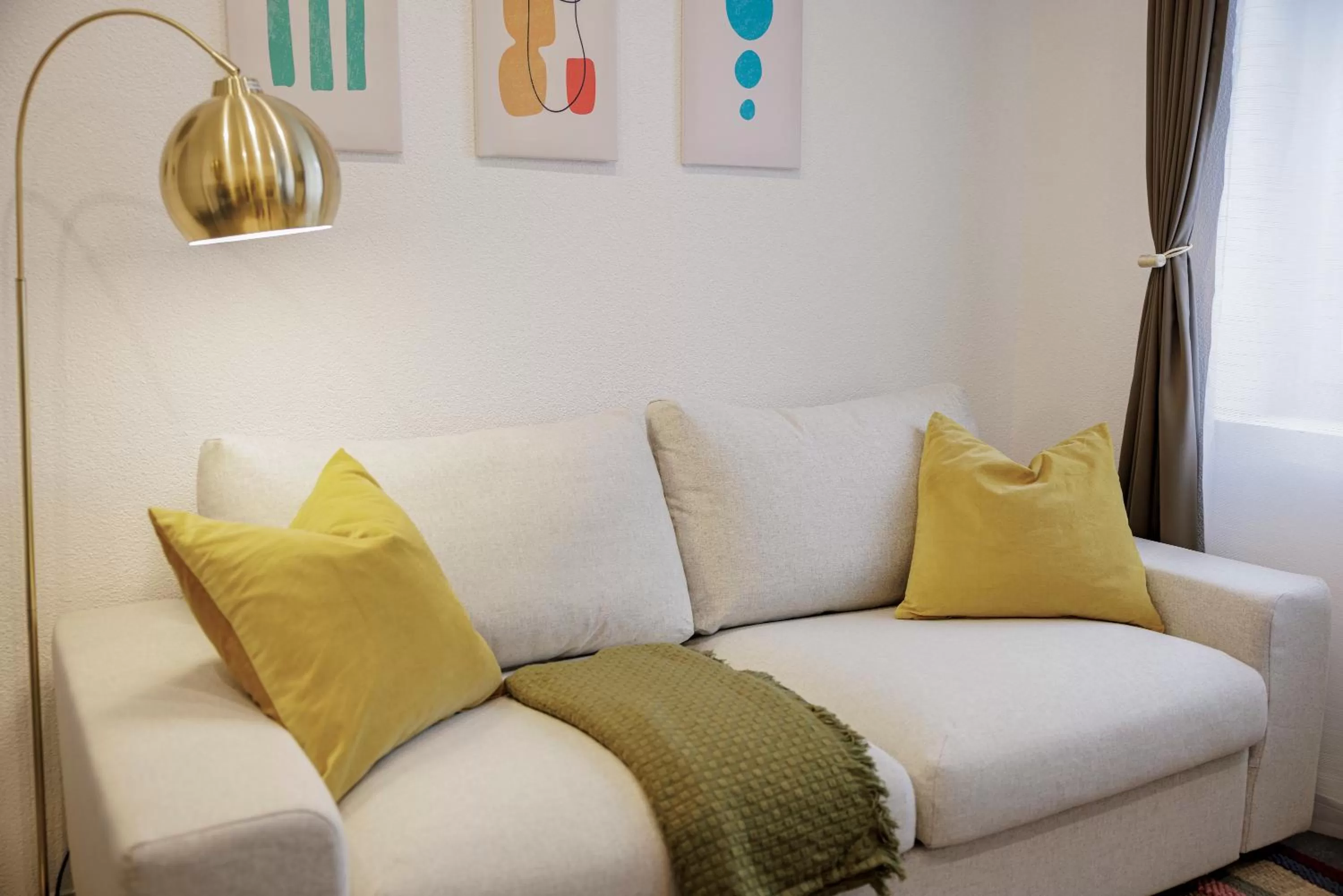 Living room, Bed in VISIMO Apartments St Georgen-Strasse St Gallen - Design City Nature