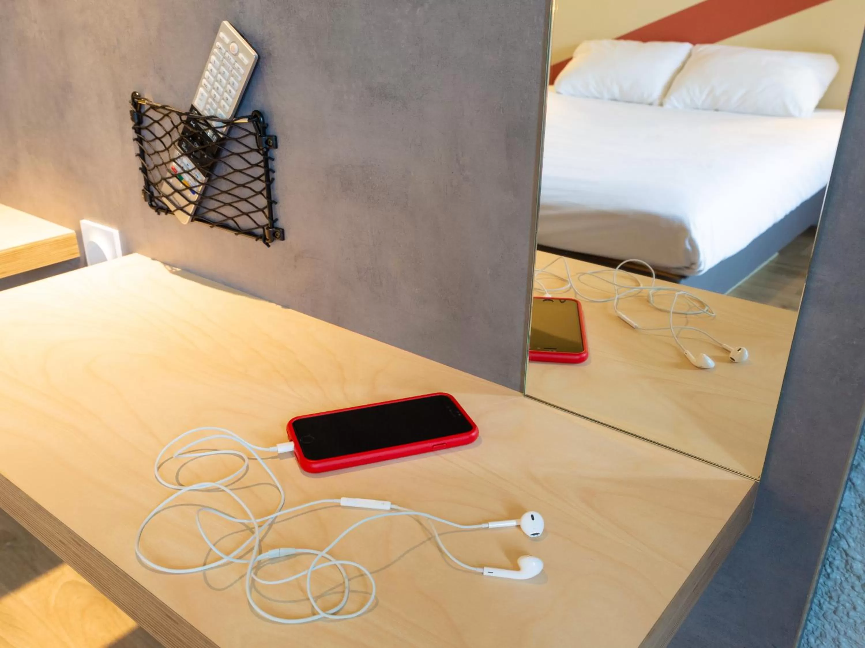 Decorative detail, Bed in ibis budget Tours Sud