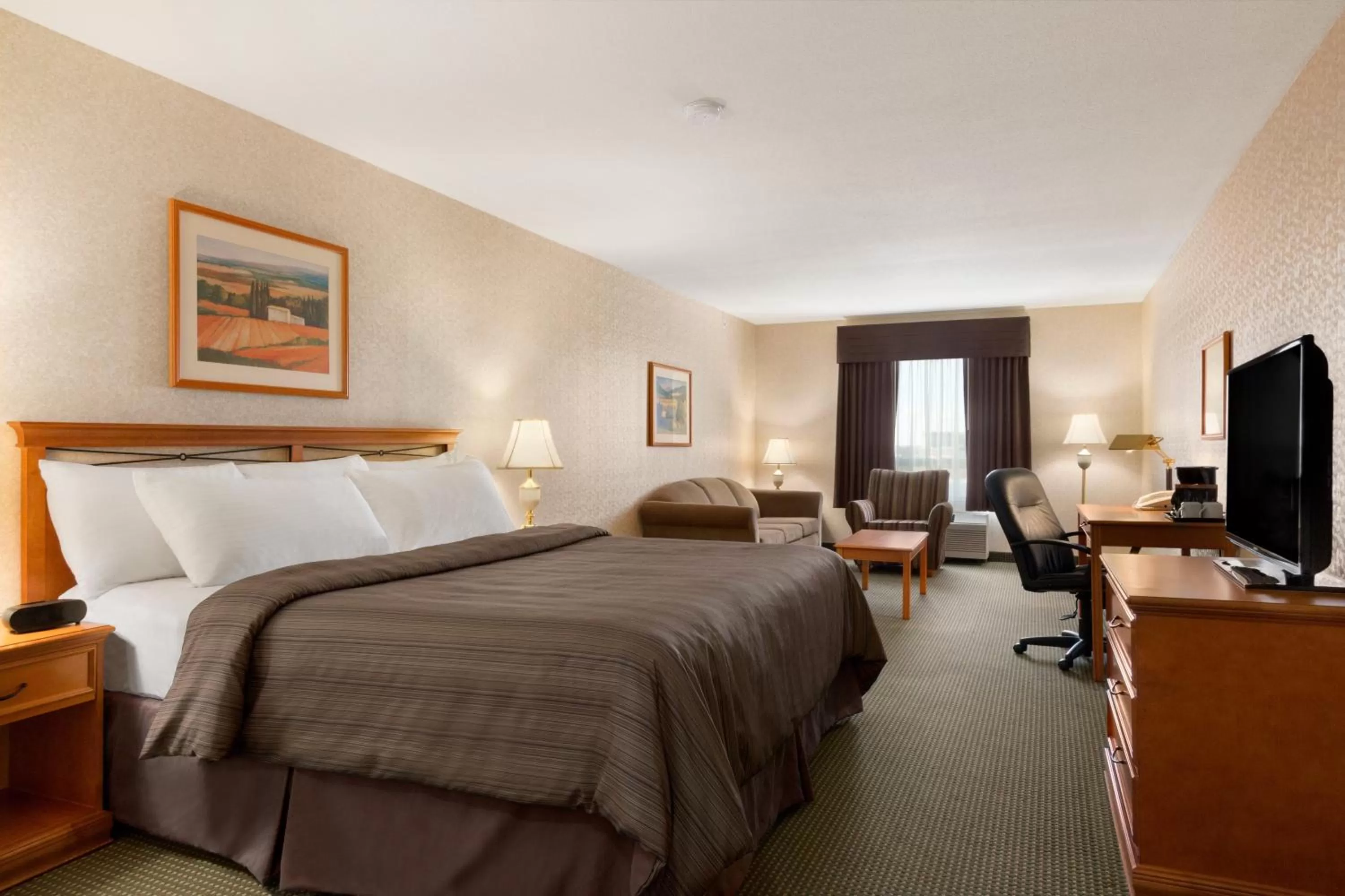 Photo of the whole room, Bed in Days Inn by Wyndham Saskatoon