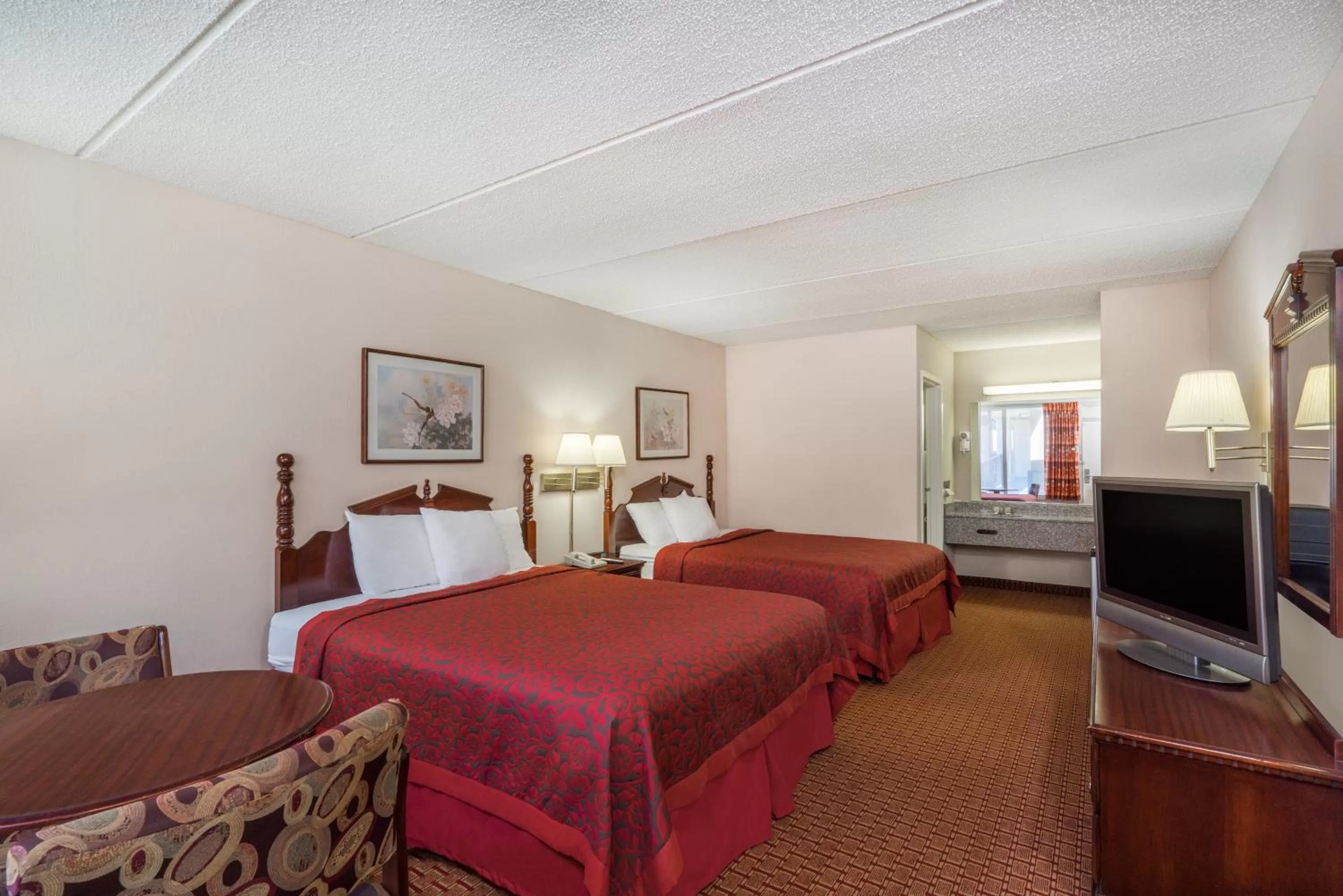 Bed in Days Inn by Wyndham Hurricane Mills