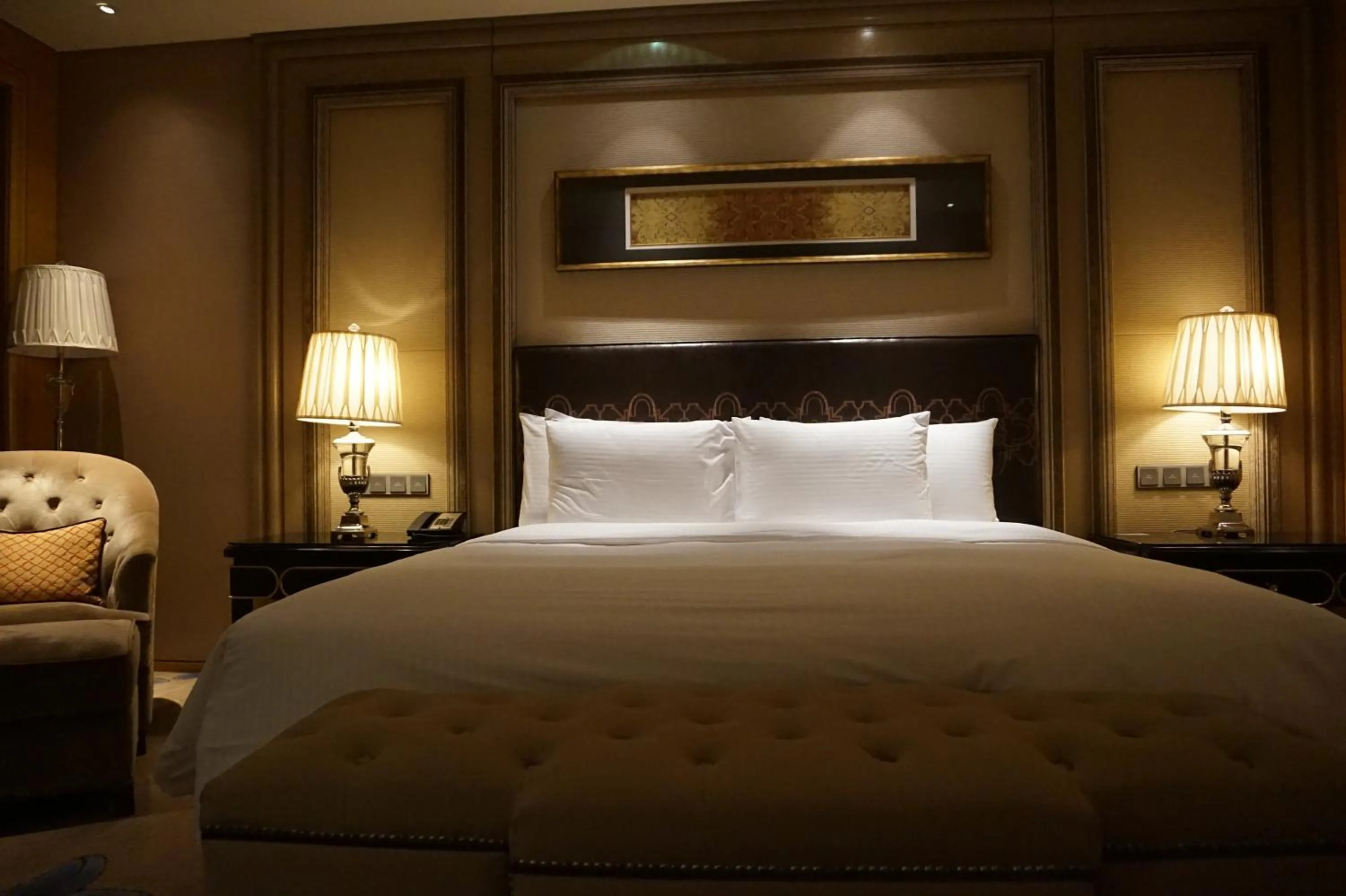 Bed in Wanda Realm Harbin Hotel